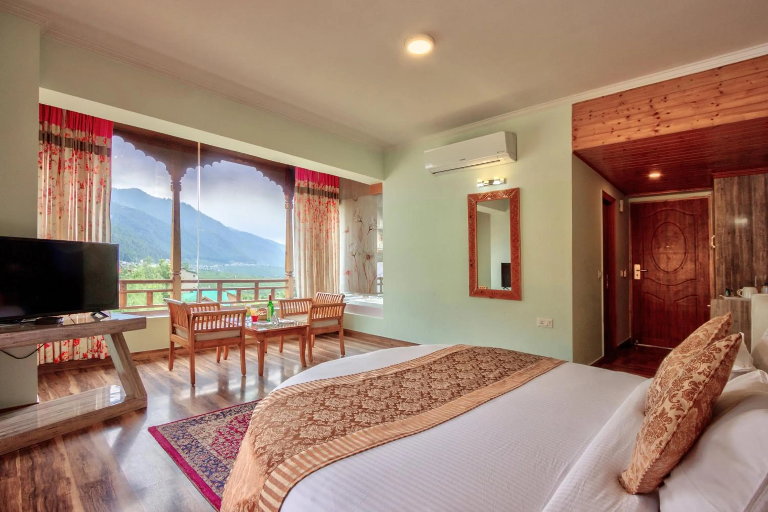Communal lounge/ TV room, Bed in Snow Flakes Resort And Spa Centrally Heated Luxury Resort