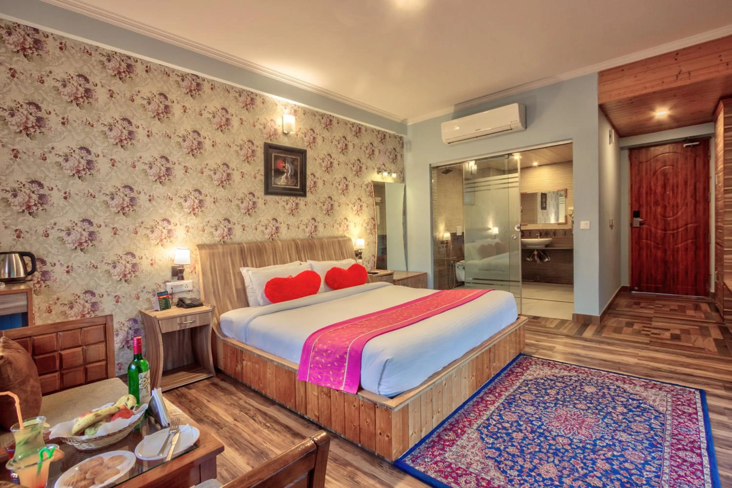 air conditioner, Bed in Snow Flakes Resort And Spa Centrally Heated Luxury Resort