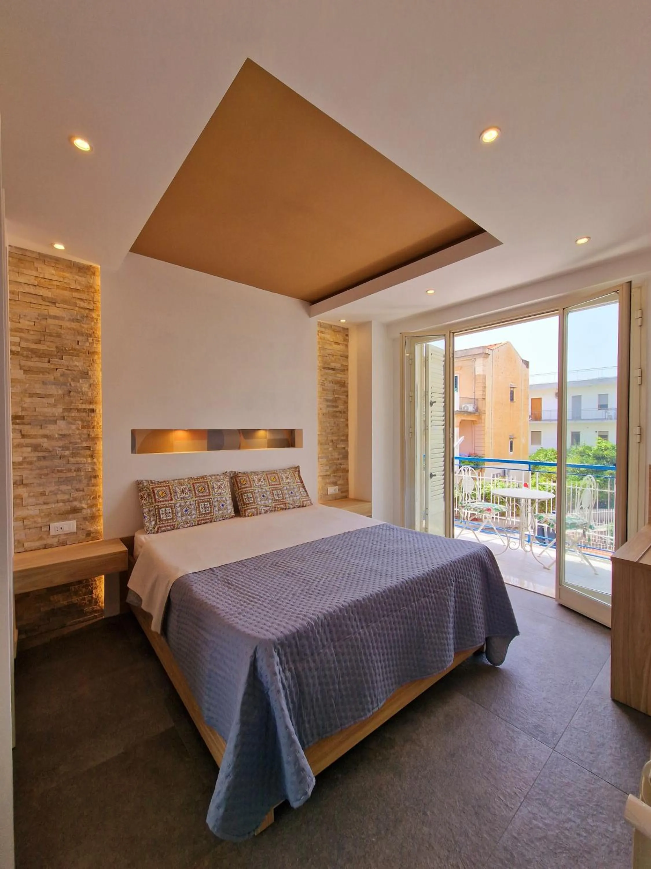 Bed in Mongibello Palace B&B