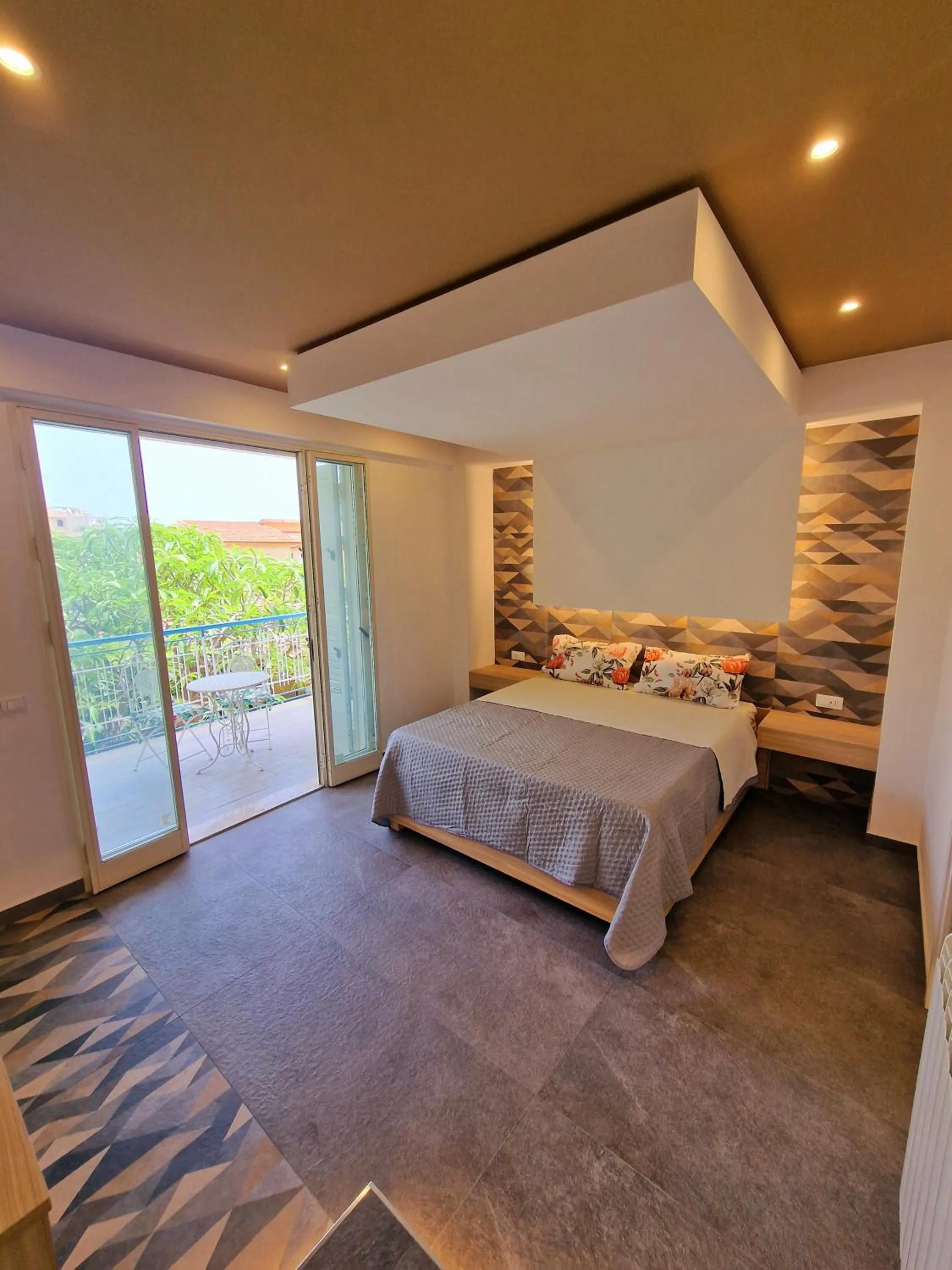 Bed in Mongibello Palace B&B