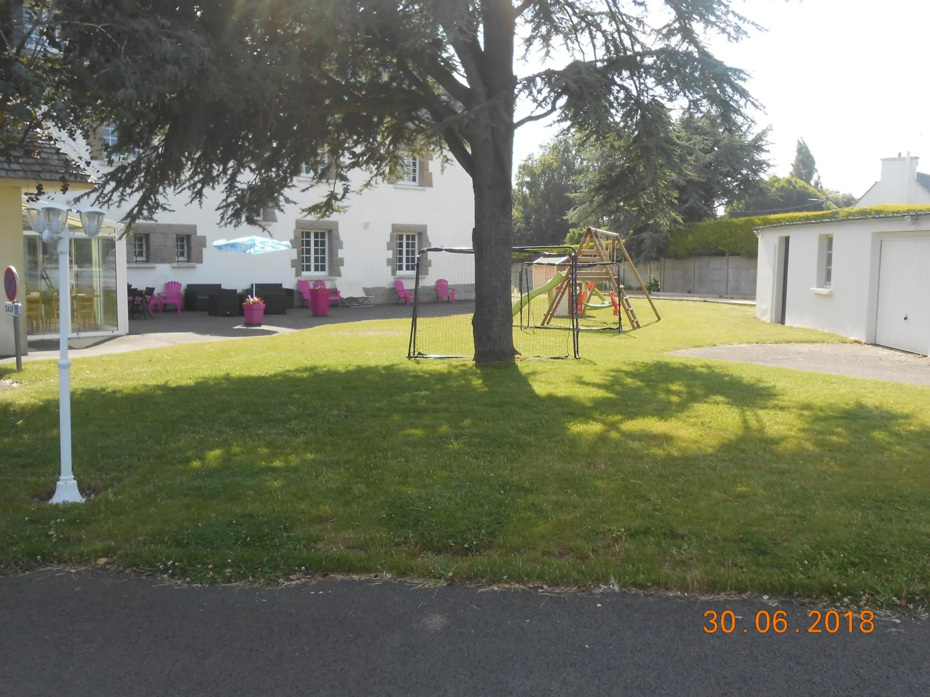 Garden in Le Relais des Primeurs LOGIS HOTEL