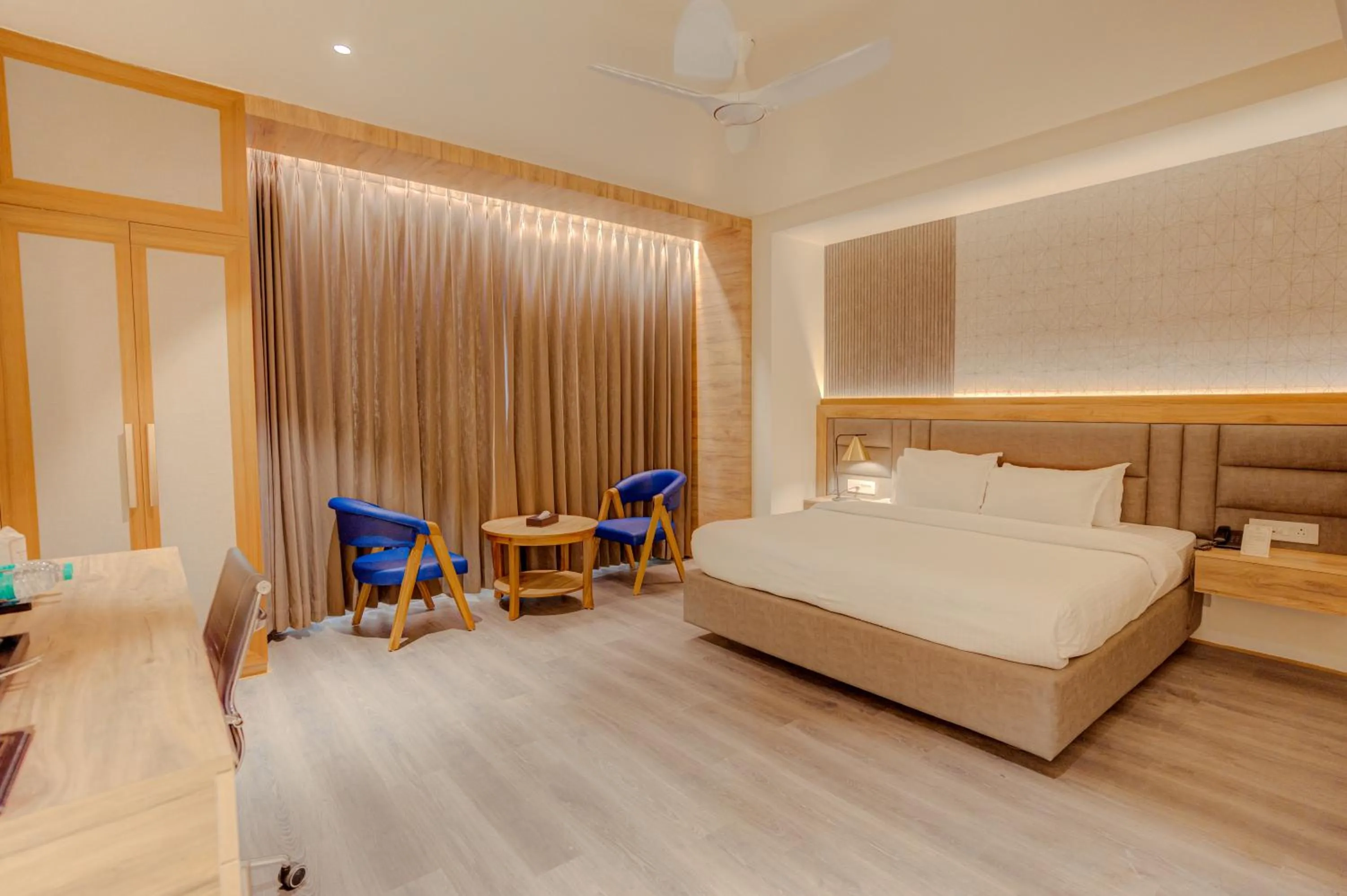 Bed in Hotel Vasundhara Palace