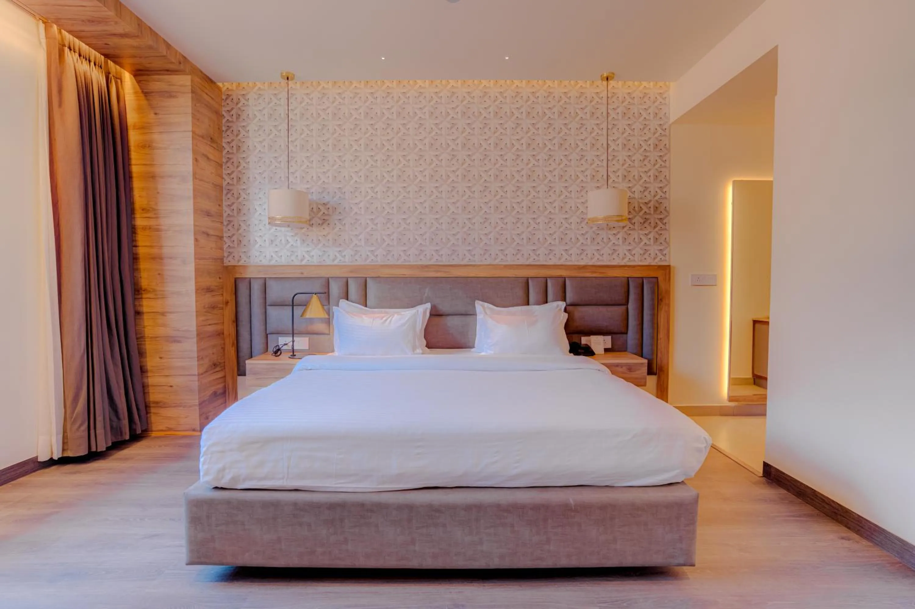 Bed in Hotel Vasundhara Palace