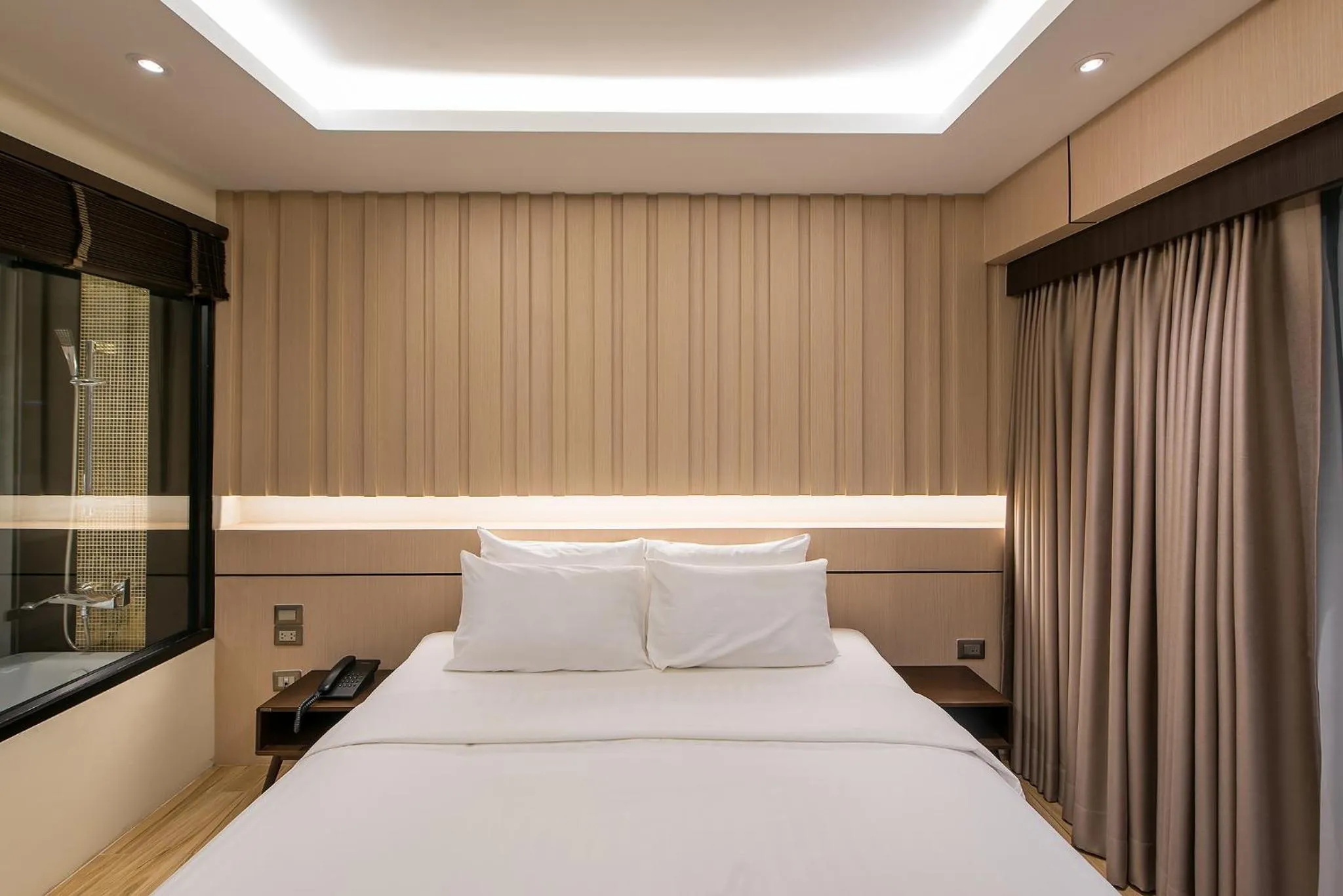 Bed in Nadee 10 Resort & Hotel