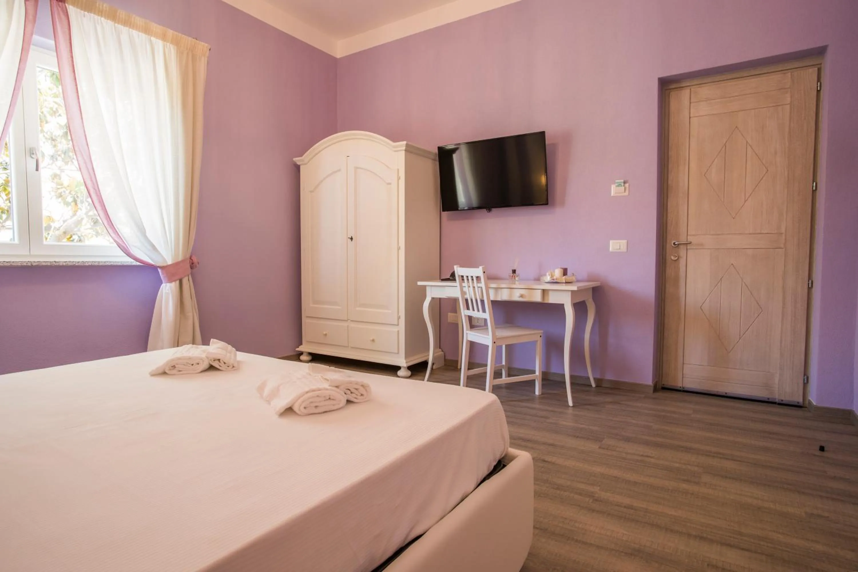 Photo of the whole room in Les Suites Magnolia