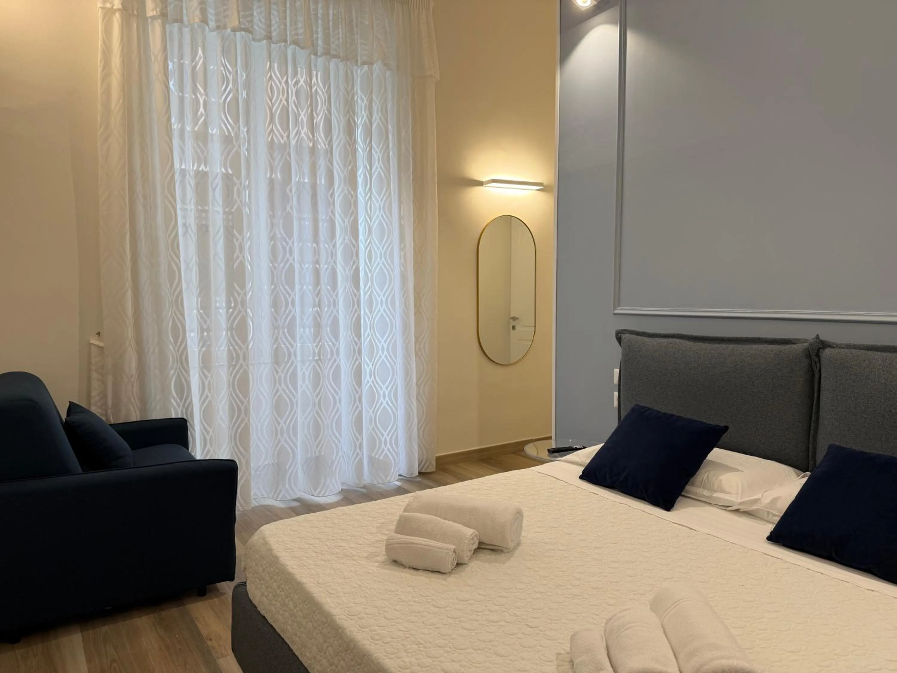 Bed in Sun Art Naples Rooms