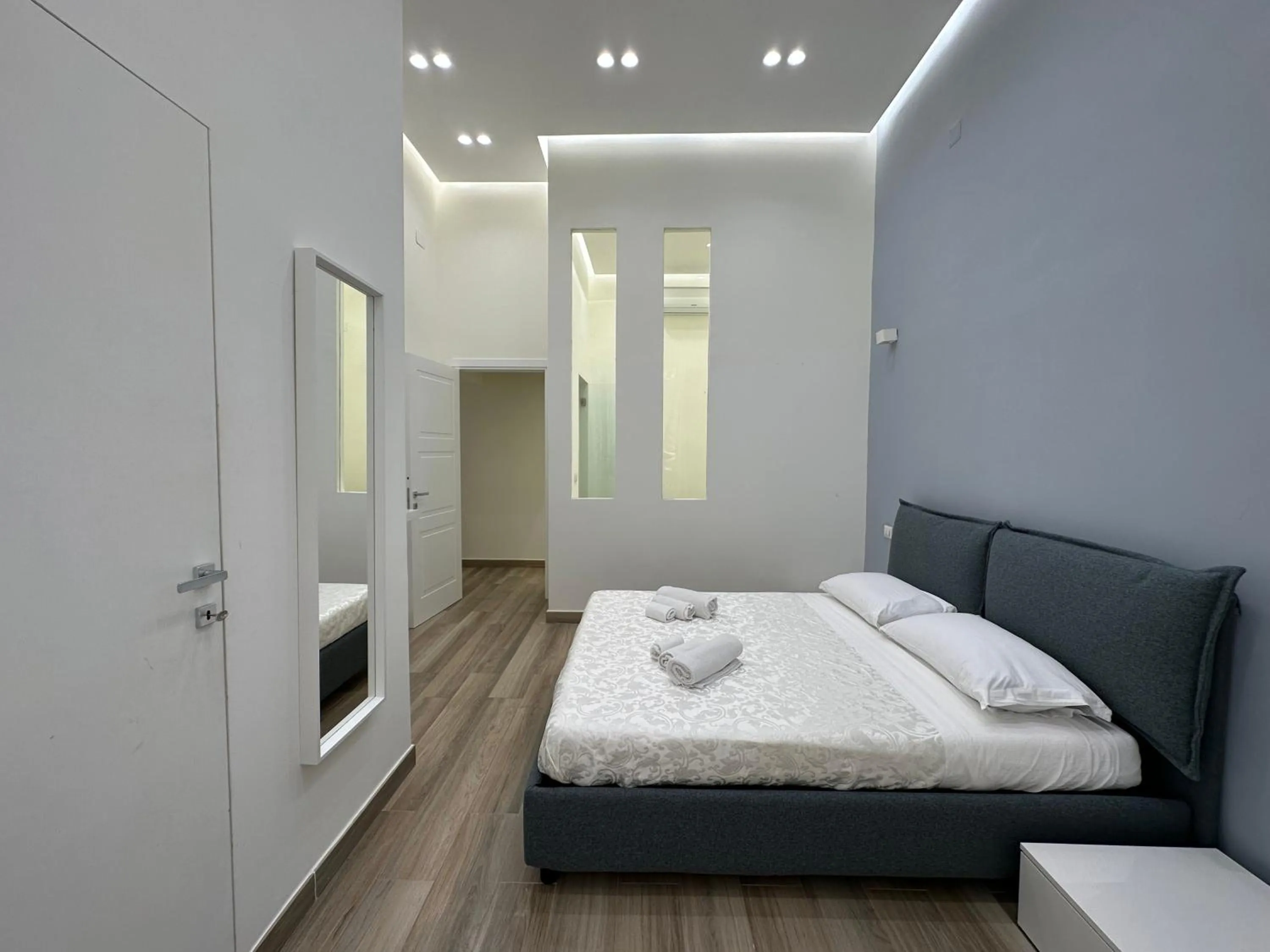 Bed in Sun Art Naples Rooms