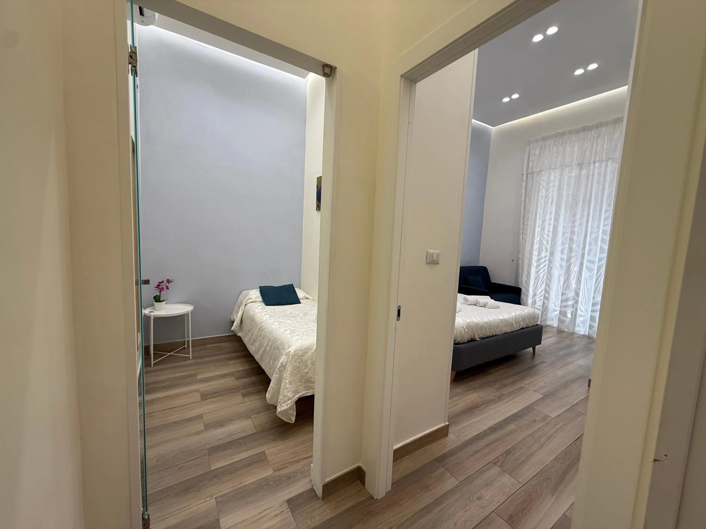 Bed in Sun Art Naples Rooms