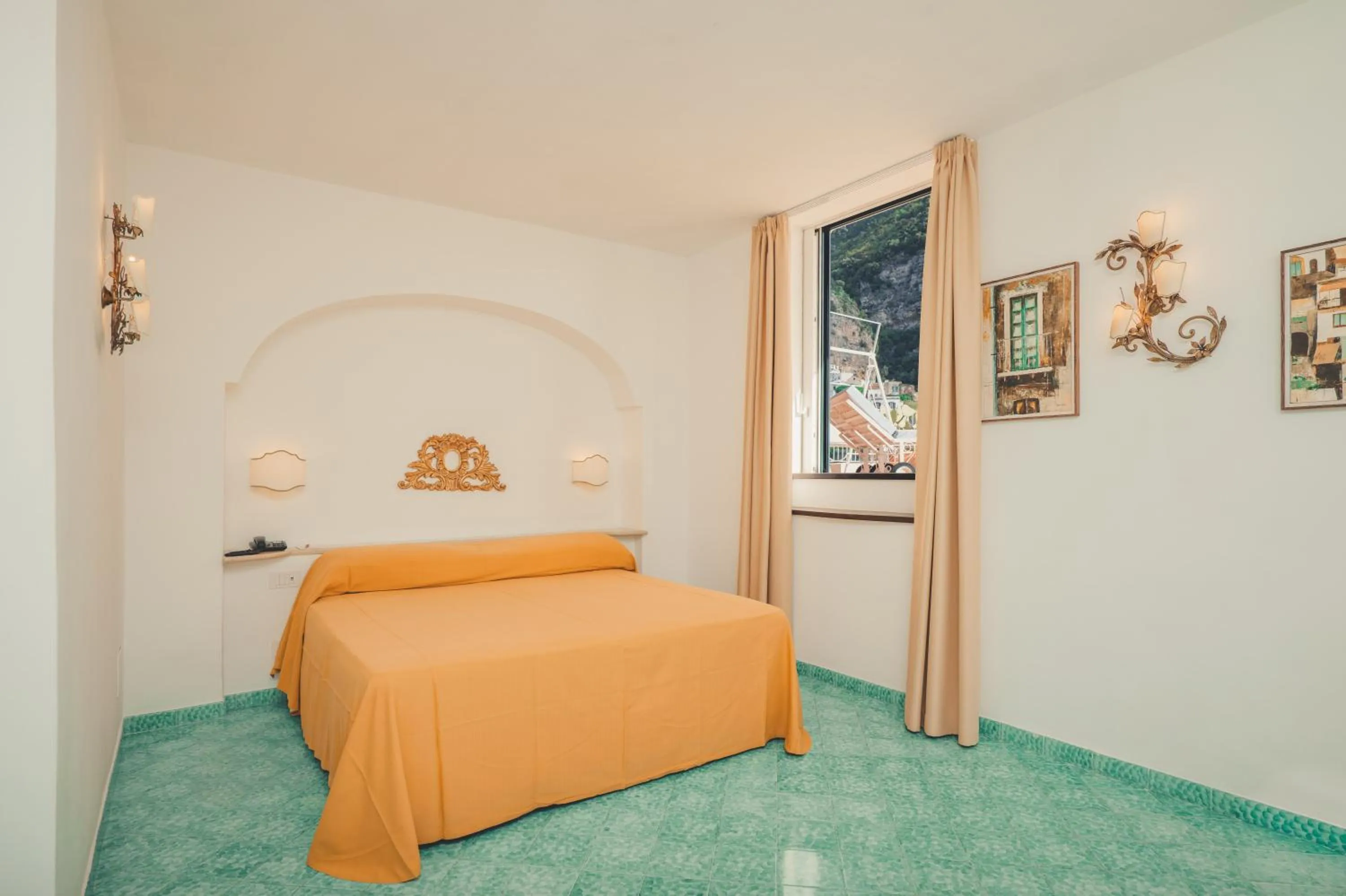 Bed in Hotel Poseidon