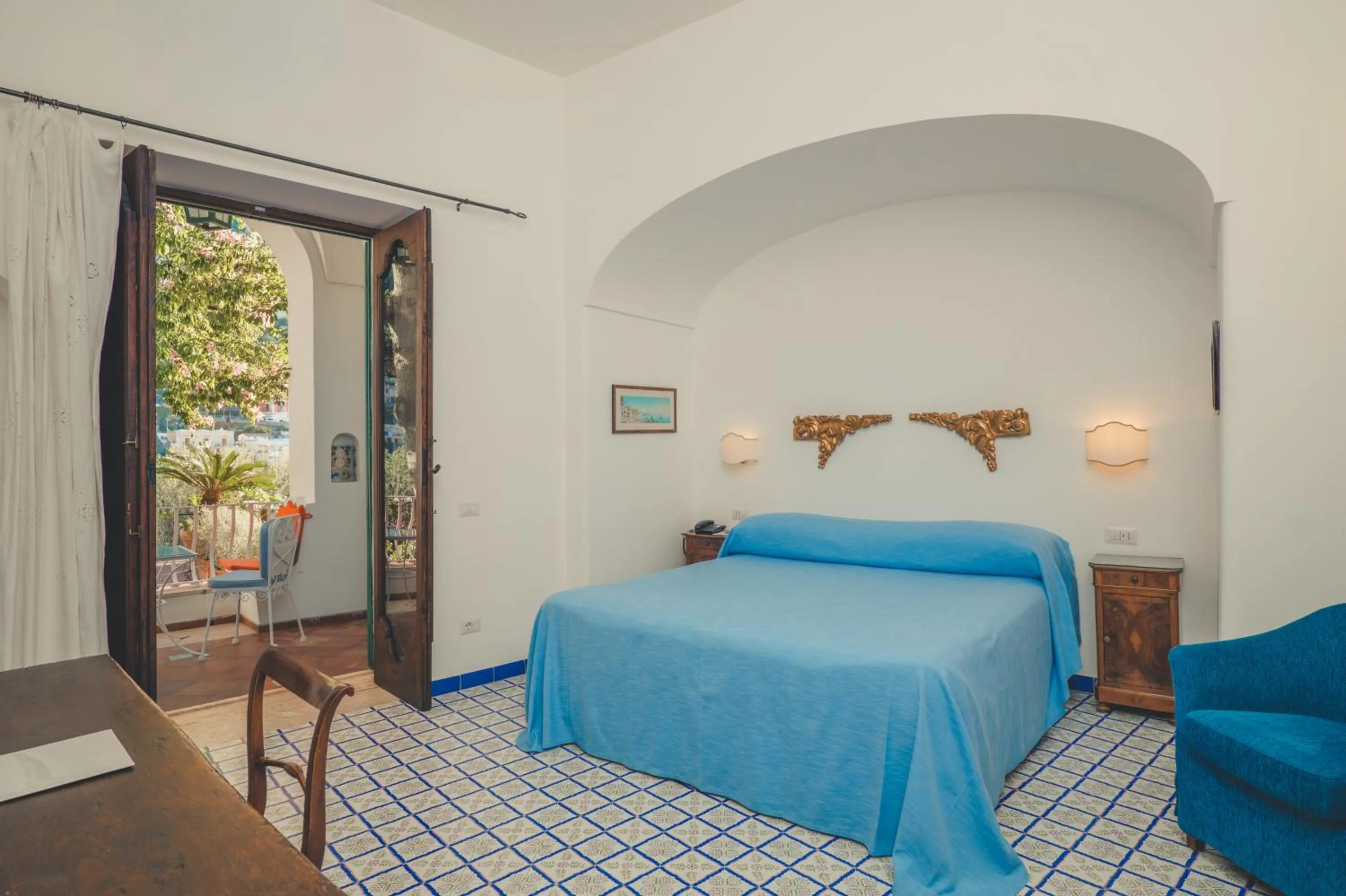 Bed in Hotel Poseidon