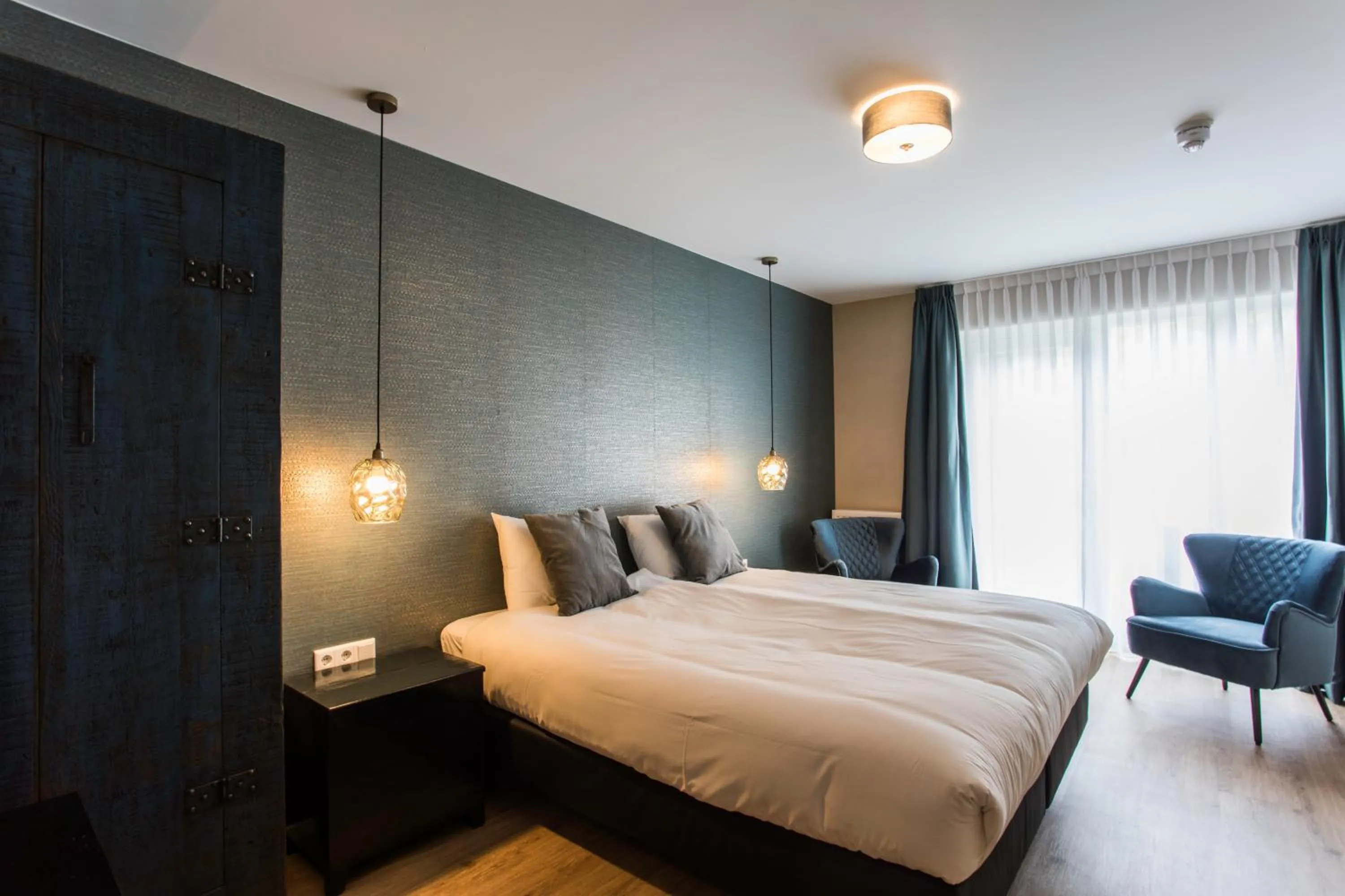 Bedroom, Bed in Rijksmonument Hotel de Sprenck - including free private parking