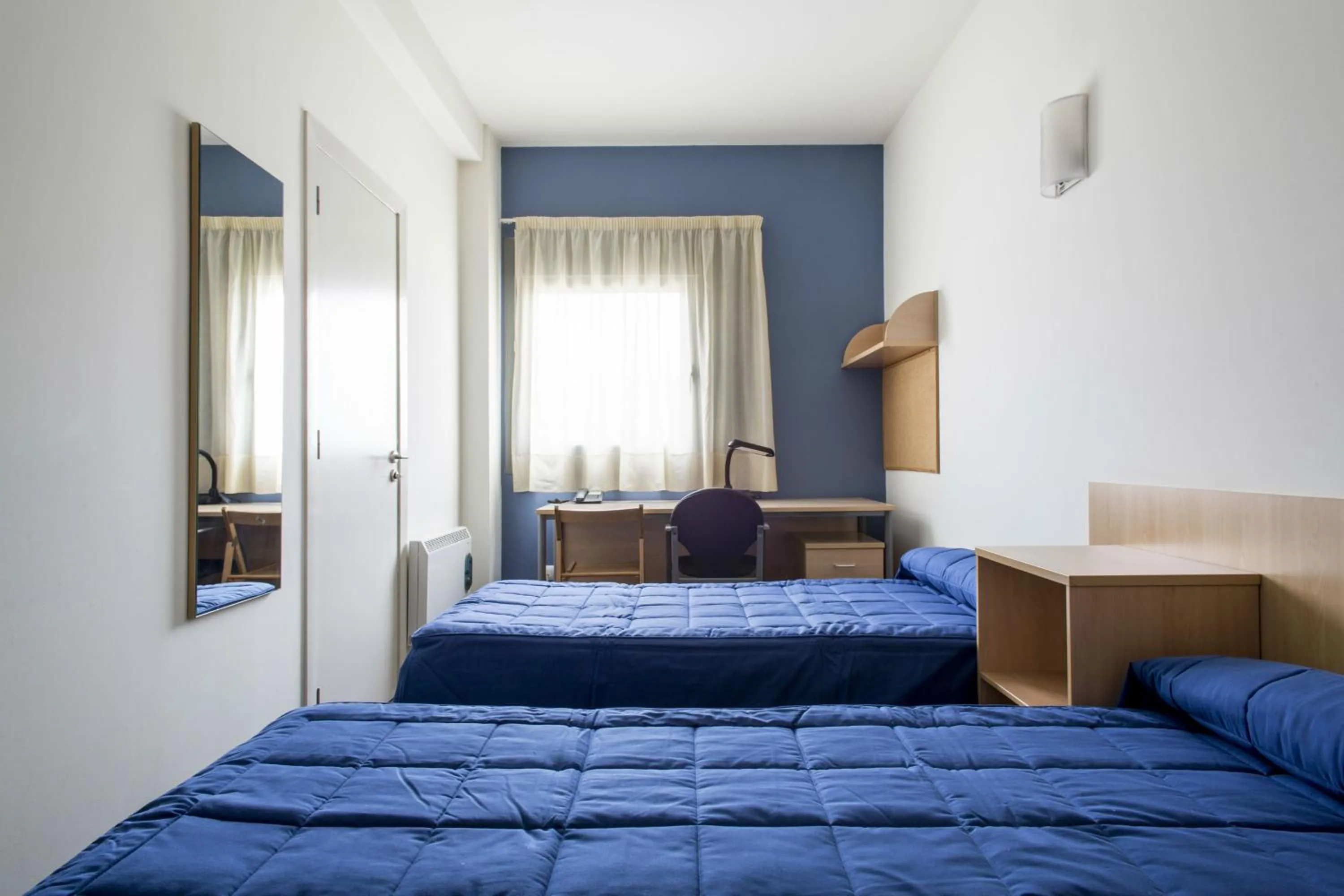 Seating area, Bed in Residencia Universitaria Resa As Burgas