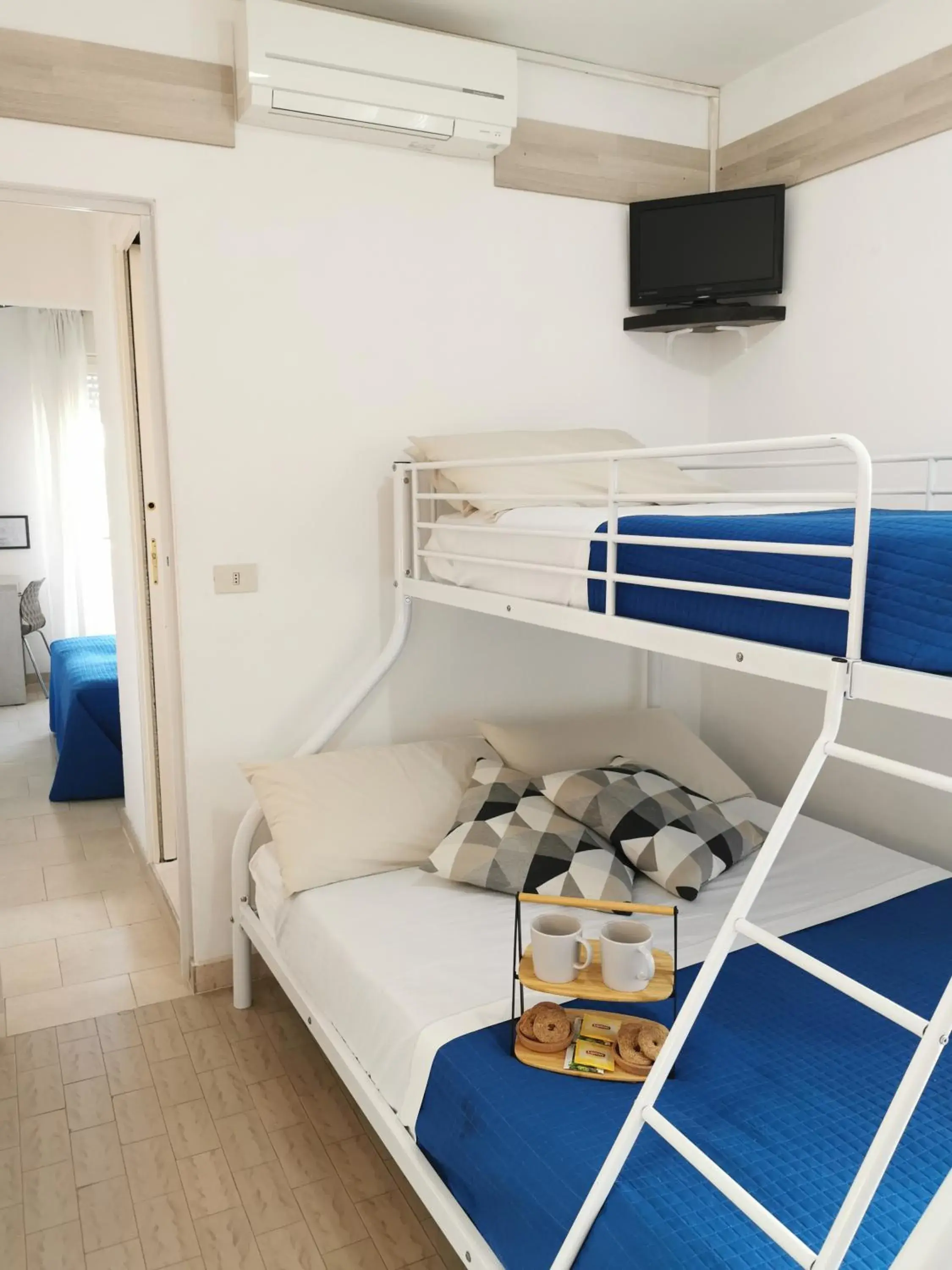 Family Room with Balcony in Hotel Bellini Family Room with Balcony in Hotel Bellini