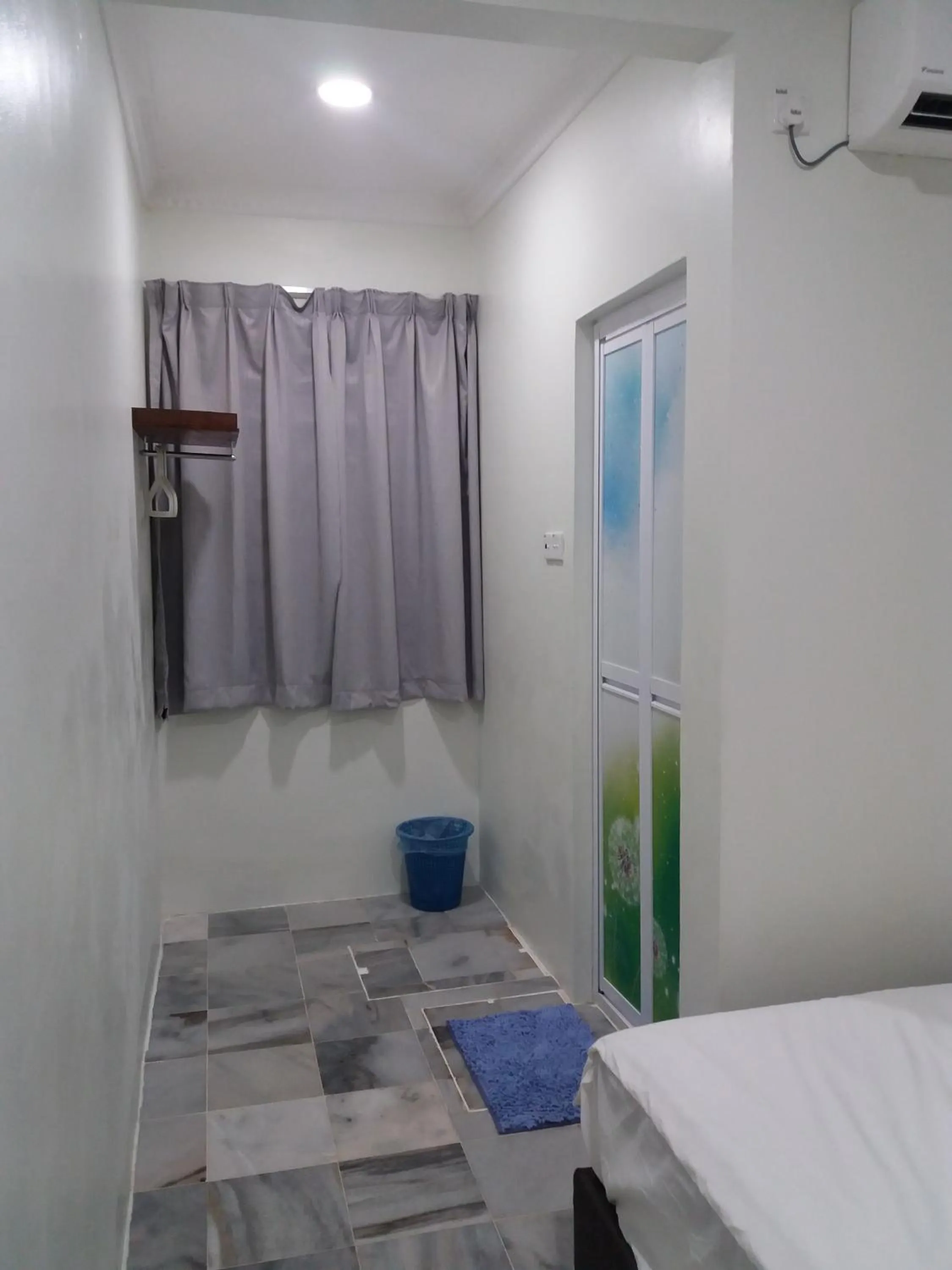 Bed in JS Guest House Air Putih
