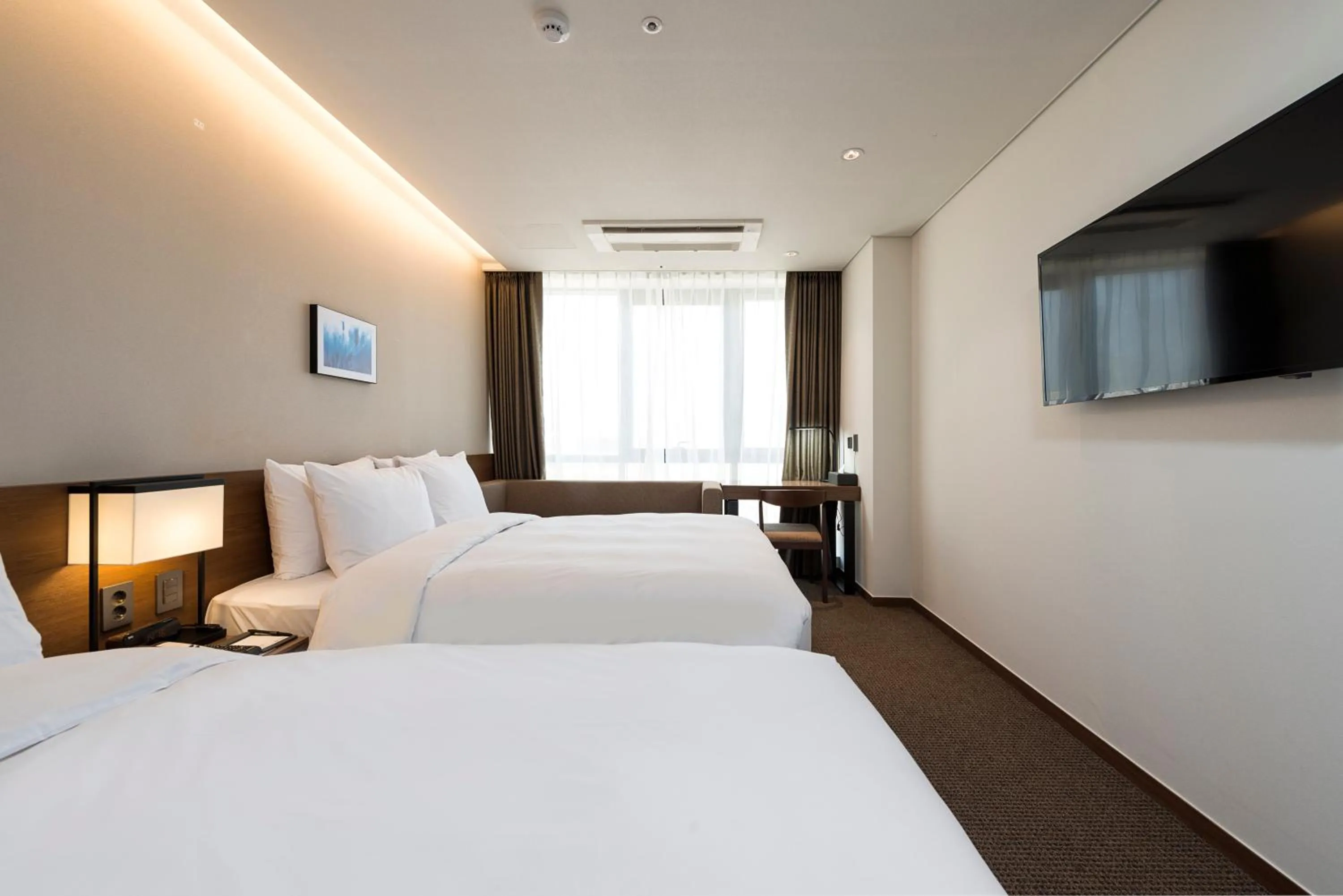 Bed in Ramada Encore by Wyndham Busan Haeundae