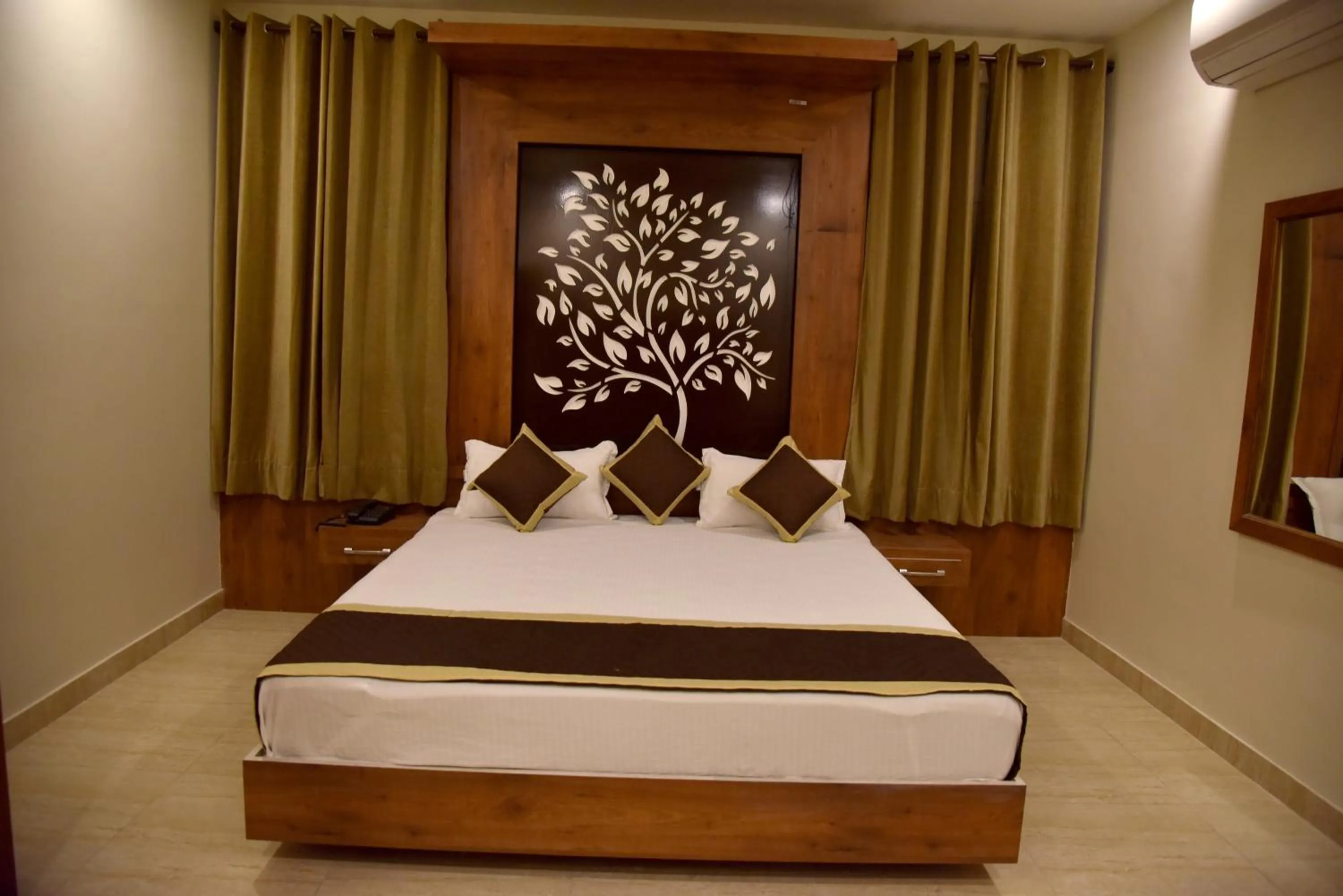 Photo of the whole room, Bed in Hotel Triveni Residency