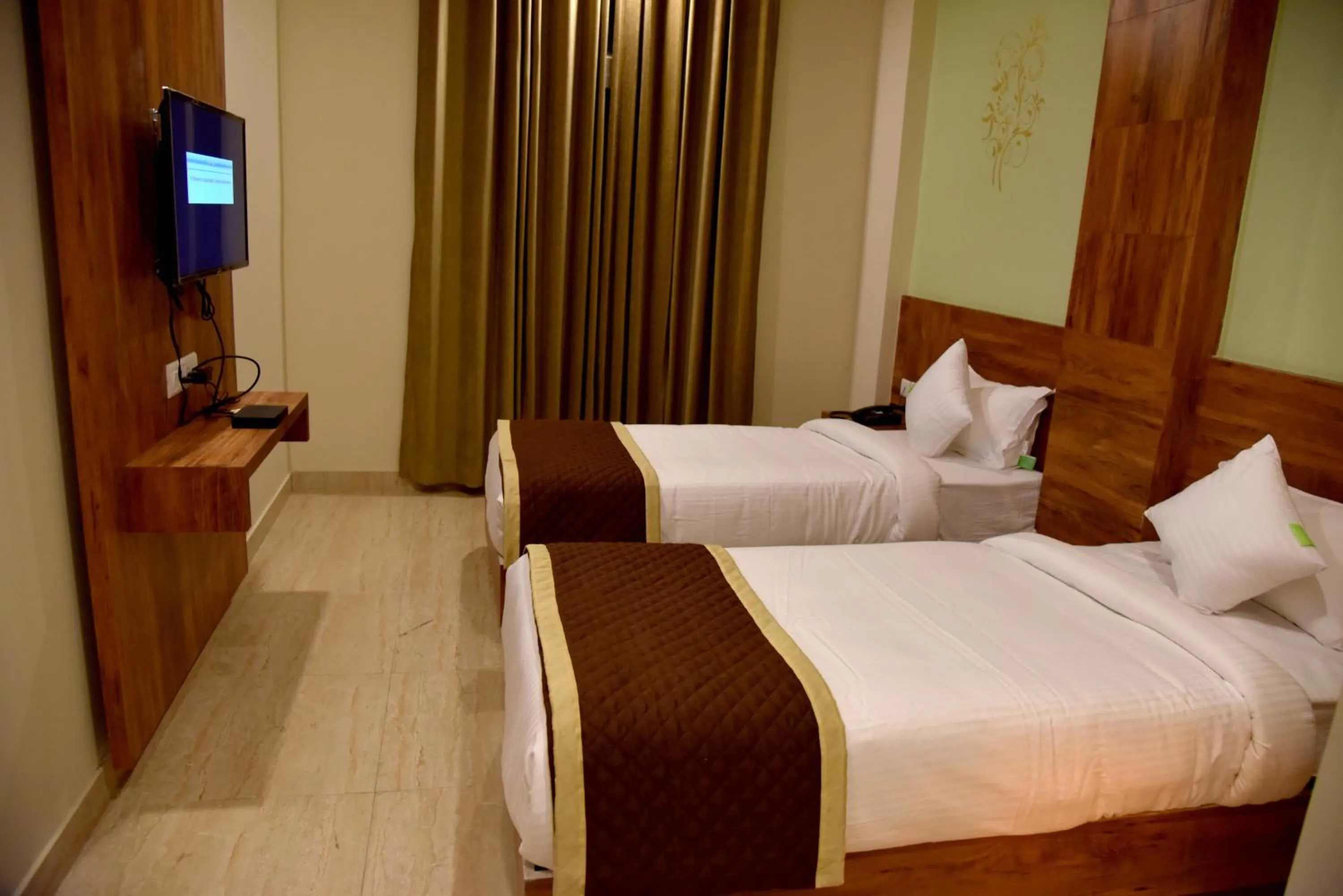 Photo of the whole room, Bed in Hotel Triveni Residency