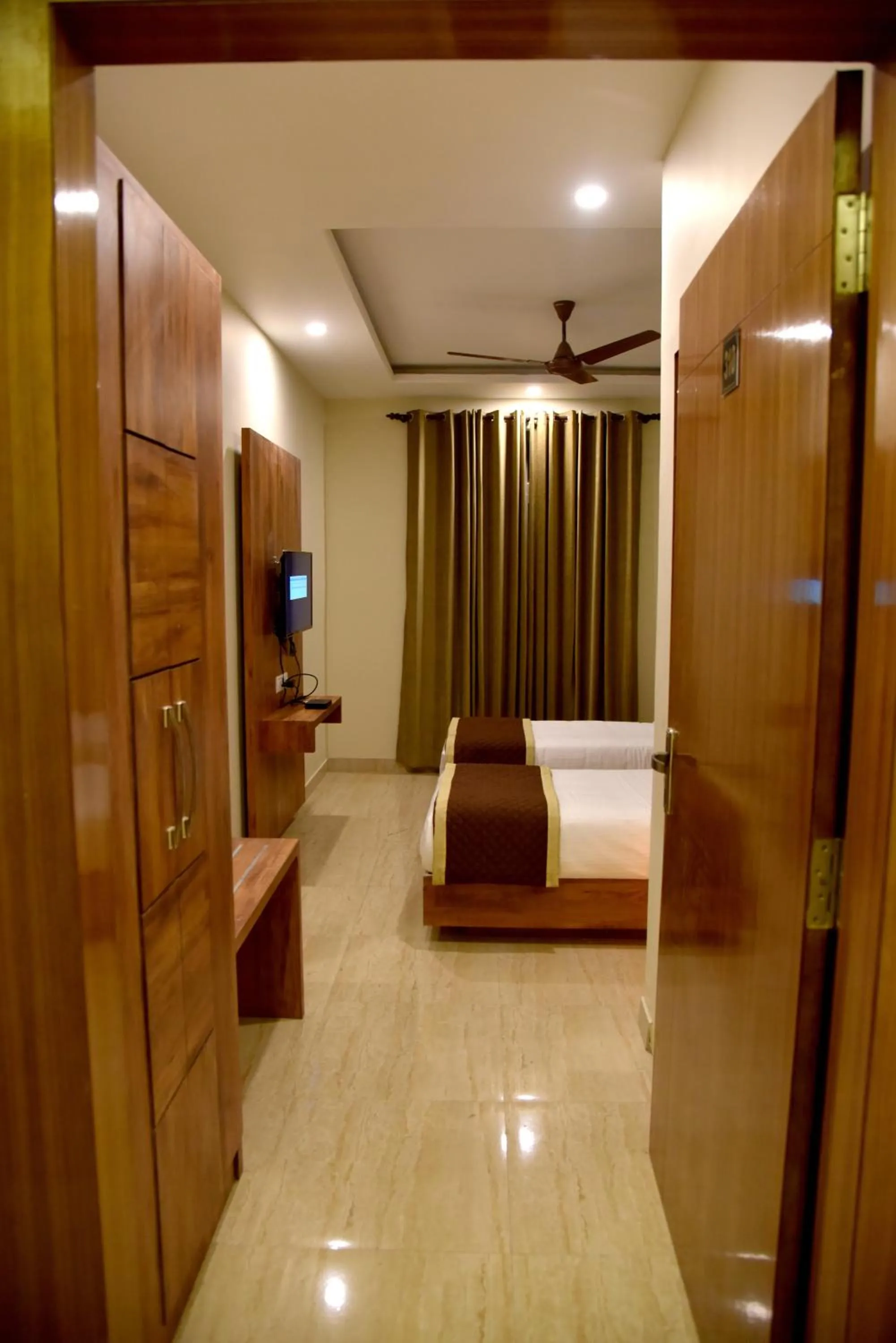 Photo of the whole room, Bed in Hotel Triveni Residency