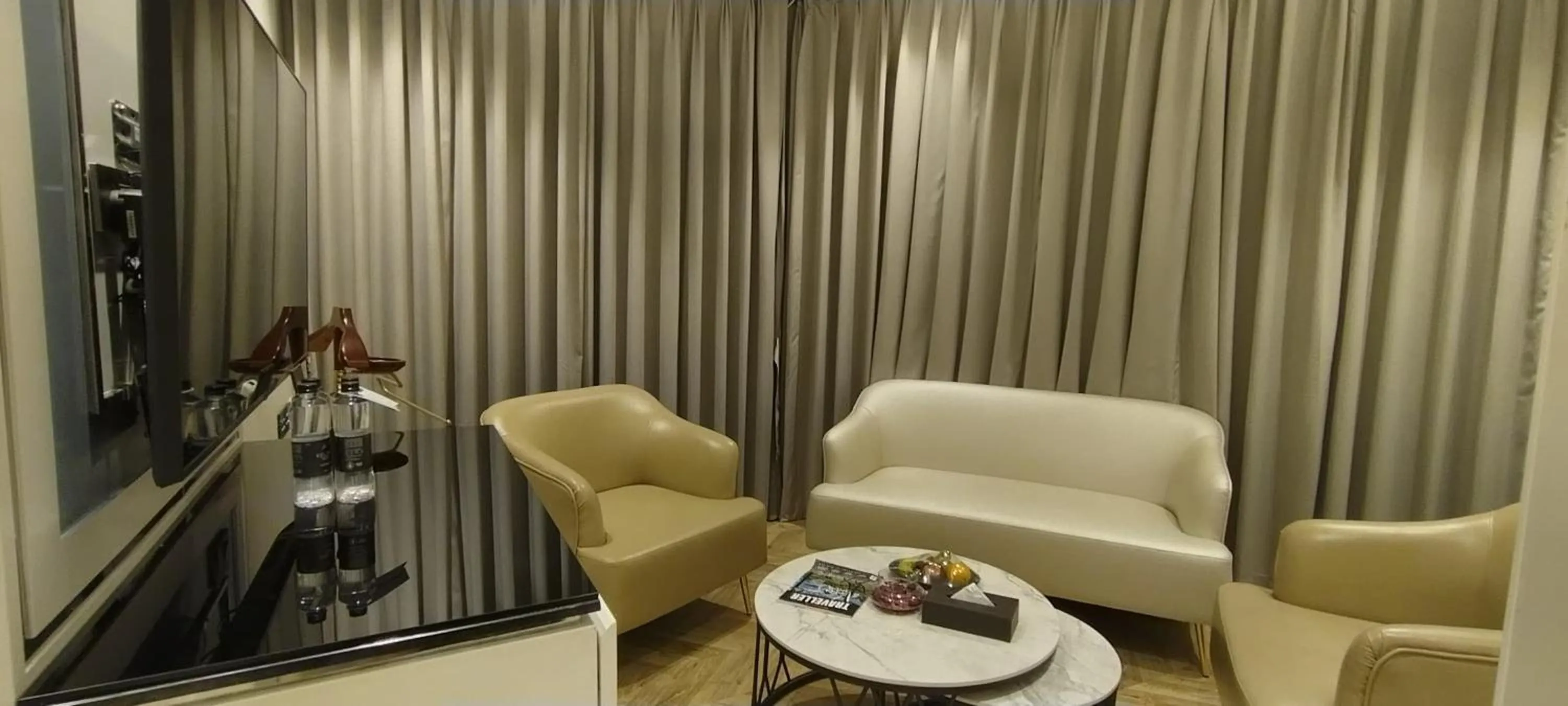 Seating area in Amanora The Fern Pune, Series by Marriott