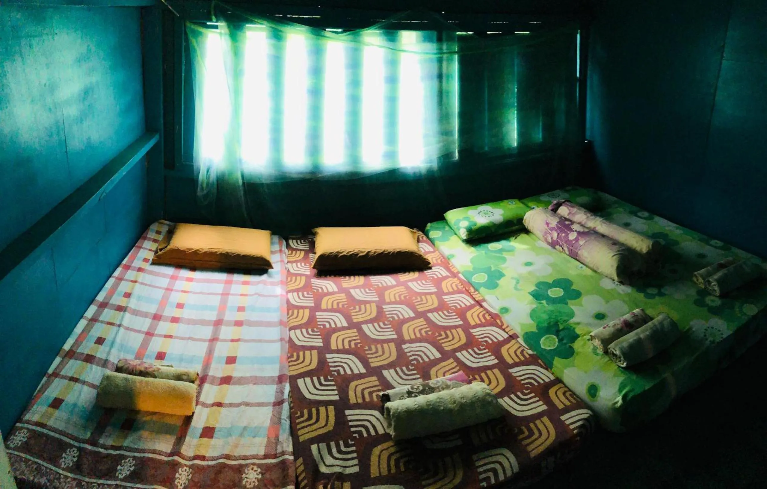 Bed in Dragon Pearl Beach Resort