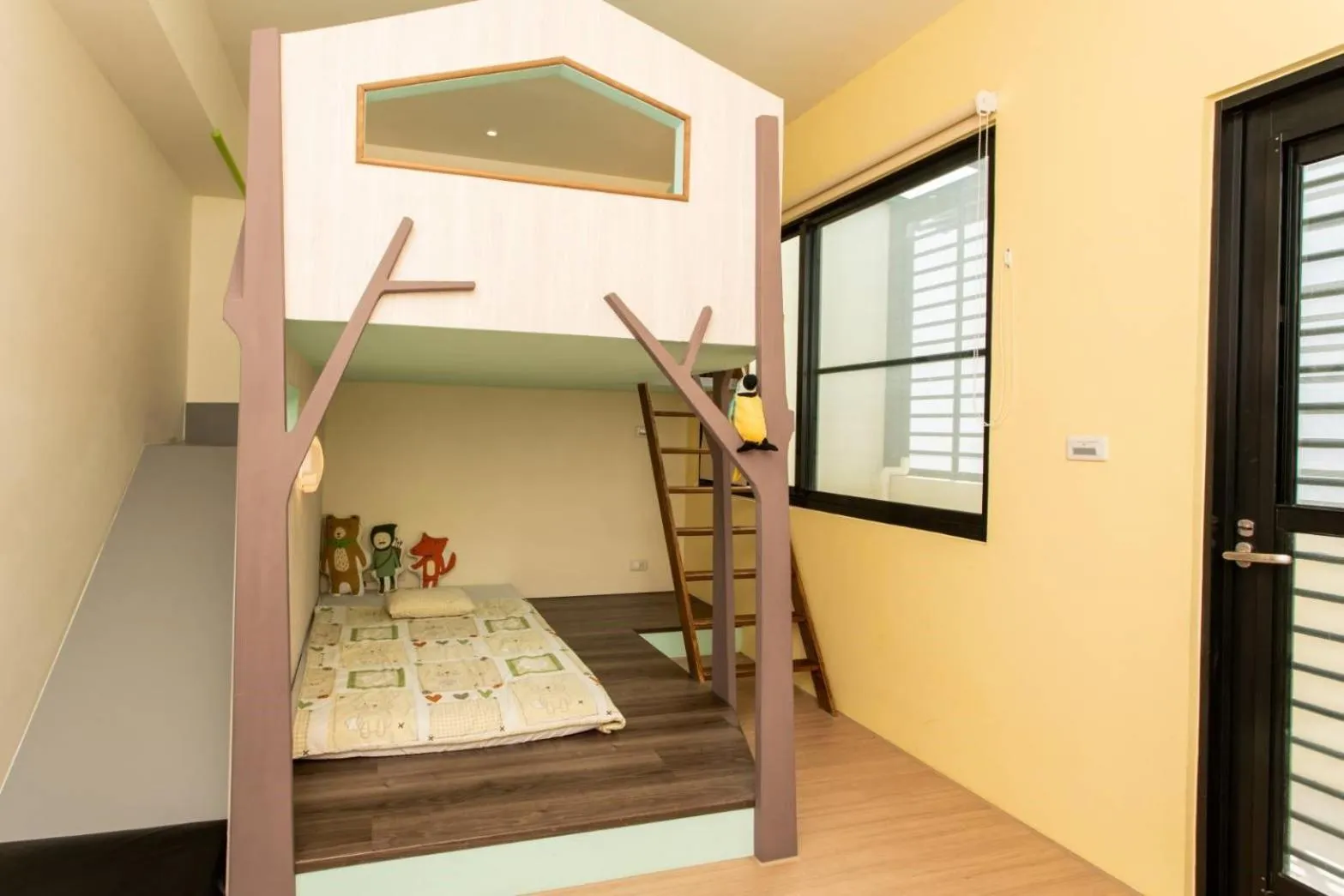 Bed in 胖蝸牛親子民宿