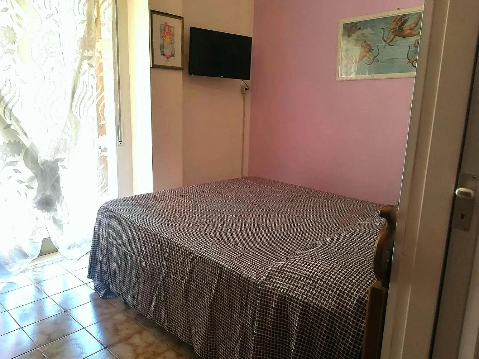 Bed in Le Gardenie b&b