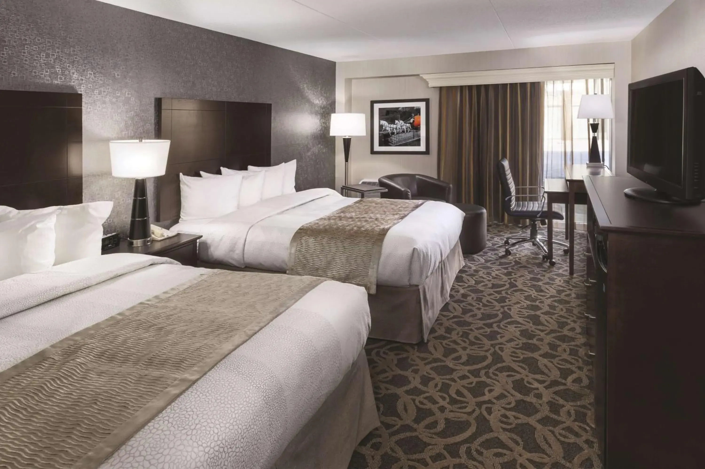 Queen Room with Two Queen Beds with Pool View in Best Western Ramkota Hotel Aberdeen Queen Room with Two Queen Beds with Pool View in Best Western Ramkota Hotel Aberdeen