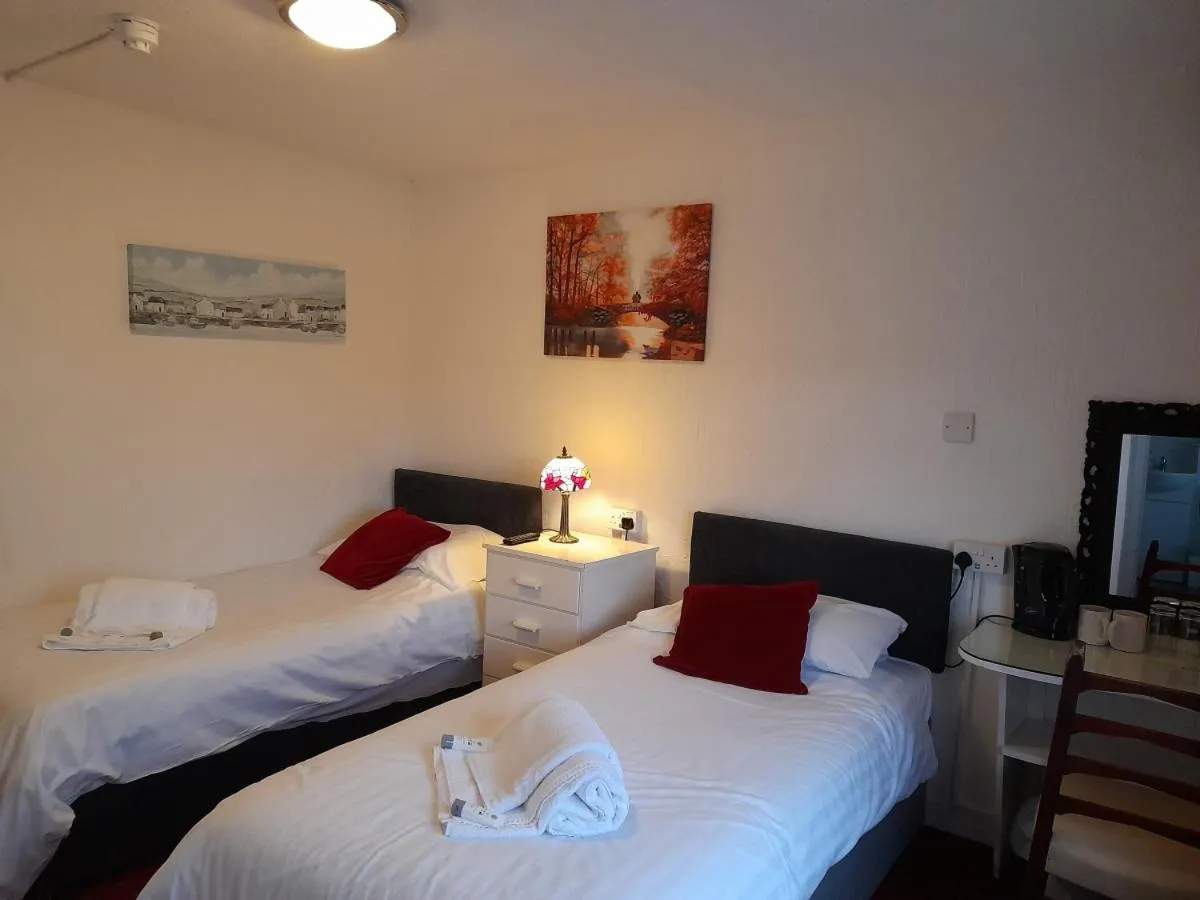 Bed in The Weary Friar Inn