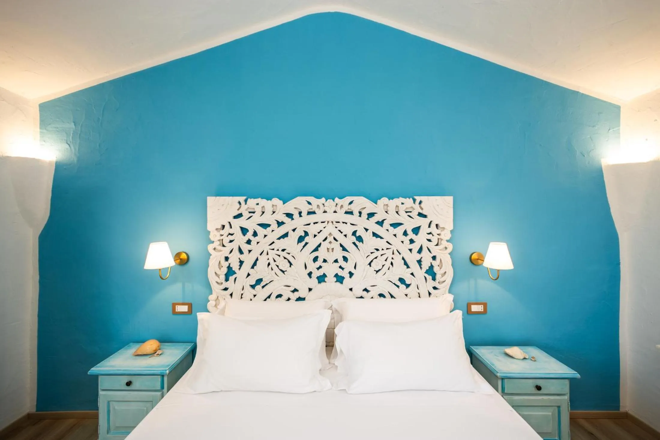 Bed in La Jacia Hotel & Resort