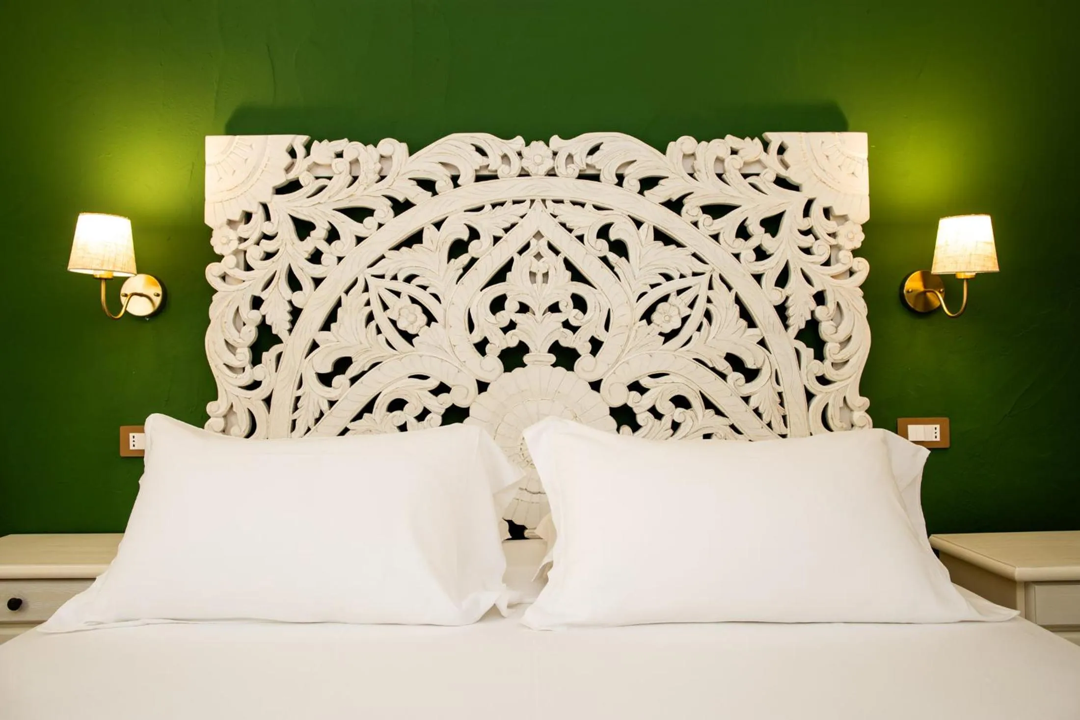 Bed in La Jacia Hotel & Resort