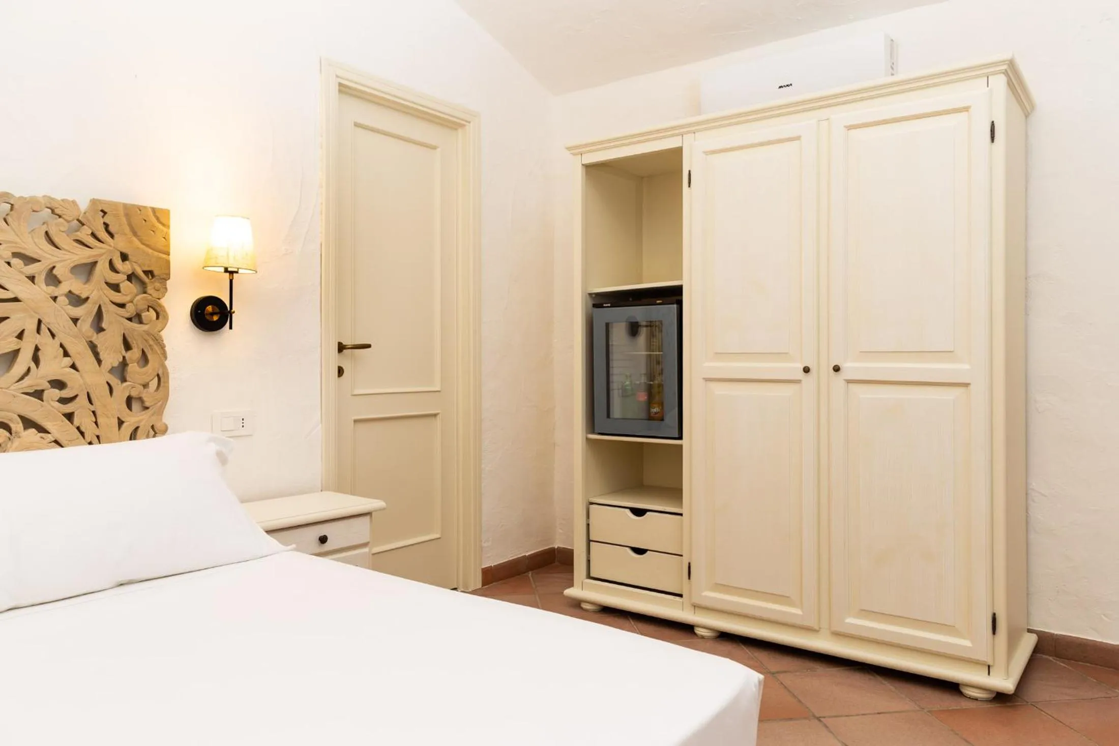 Bed in La Jacia Hotel & Resort