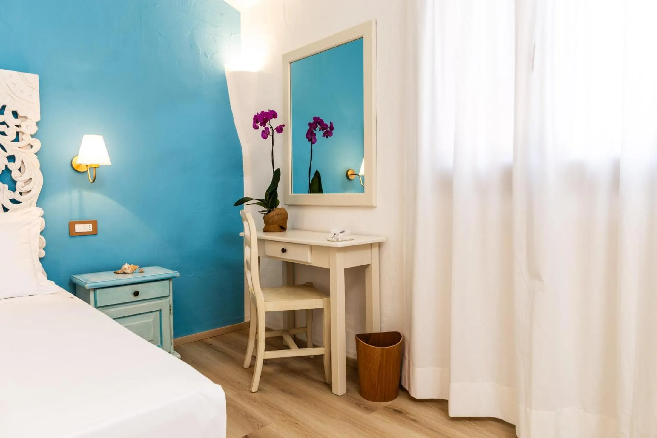 Bed in La Jacia Hotel & Resort