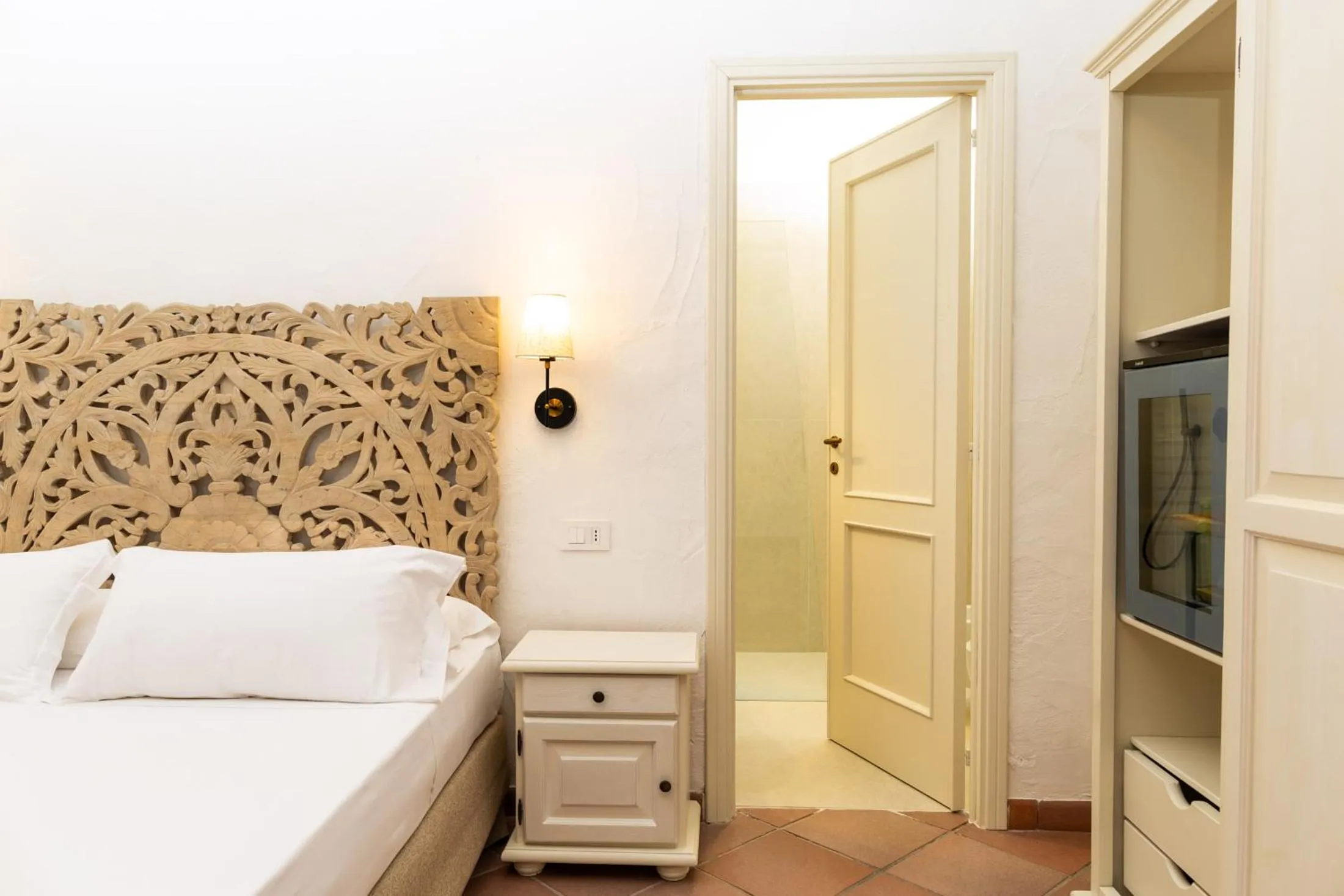 Bed in La Jacia Hotel & Resort