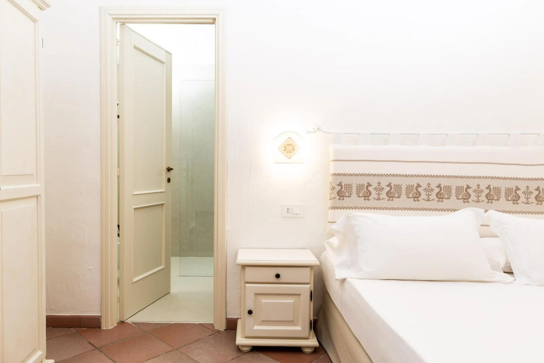 Bed in La Jacia Hotel & Resort