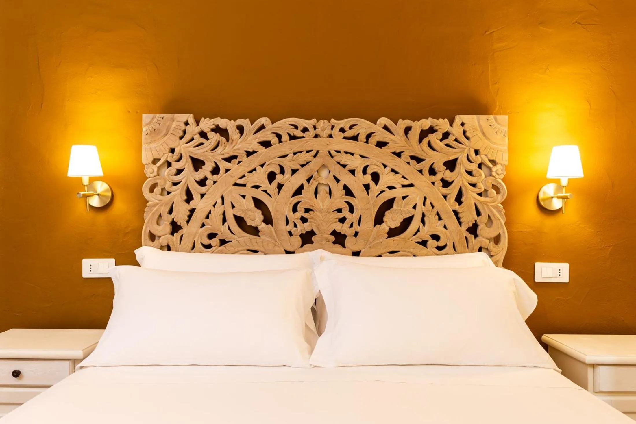 Bed in La Jacia Hotel & Resort