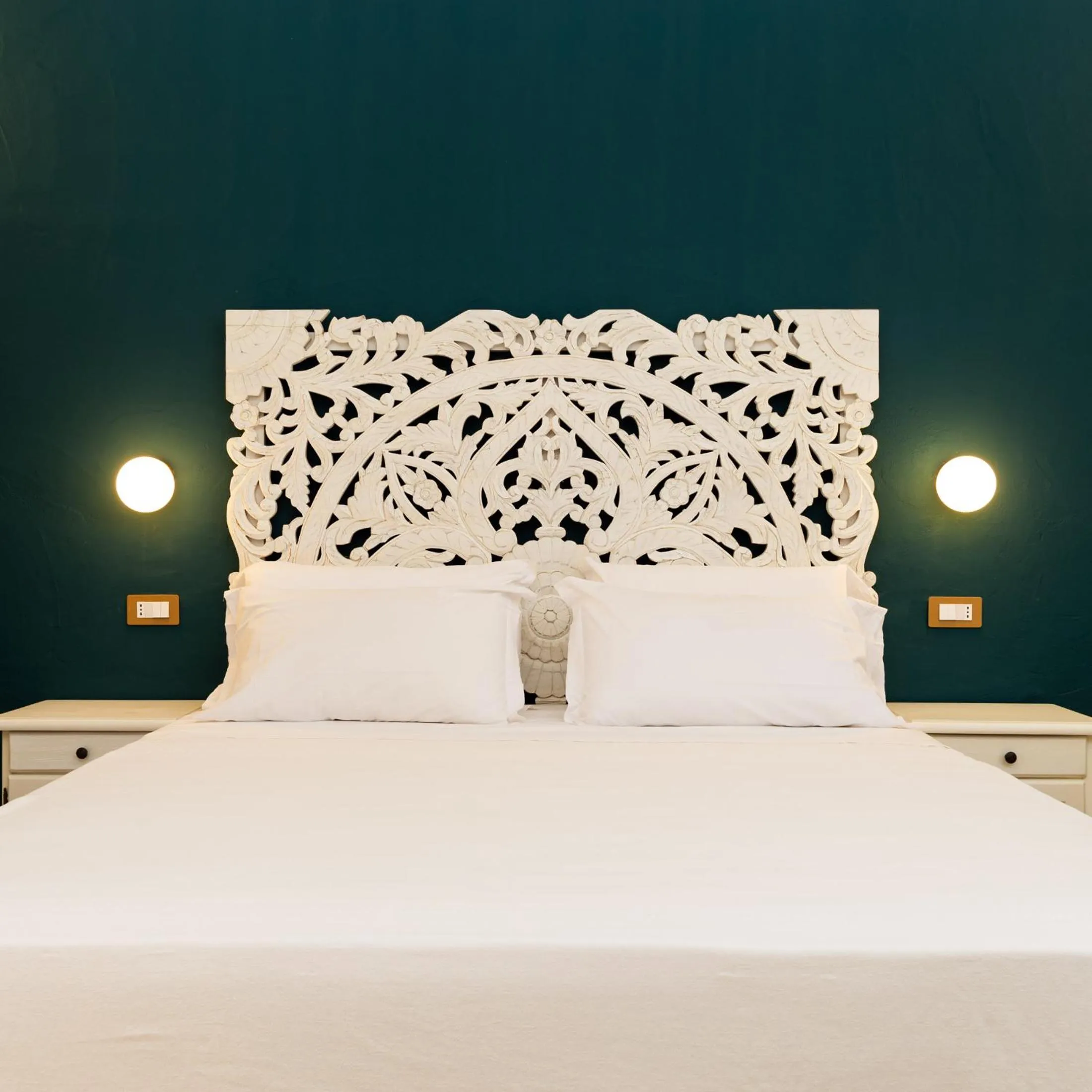 Bed in La Jacia Hotel & Resort