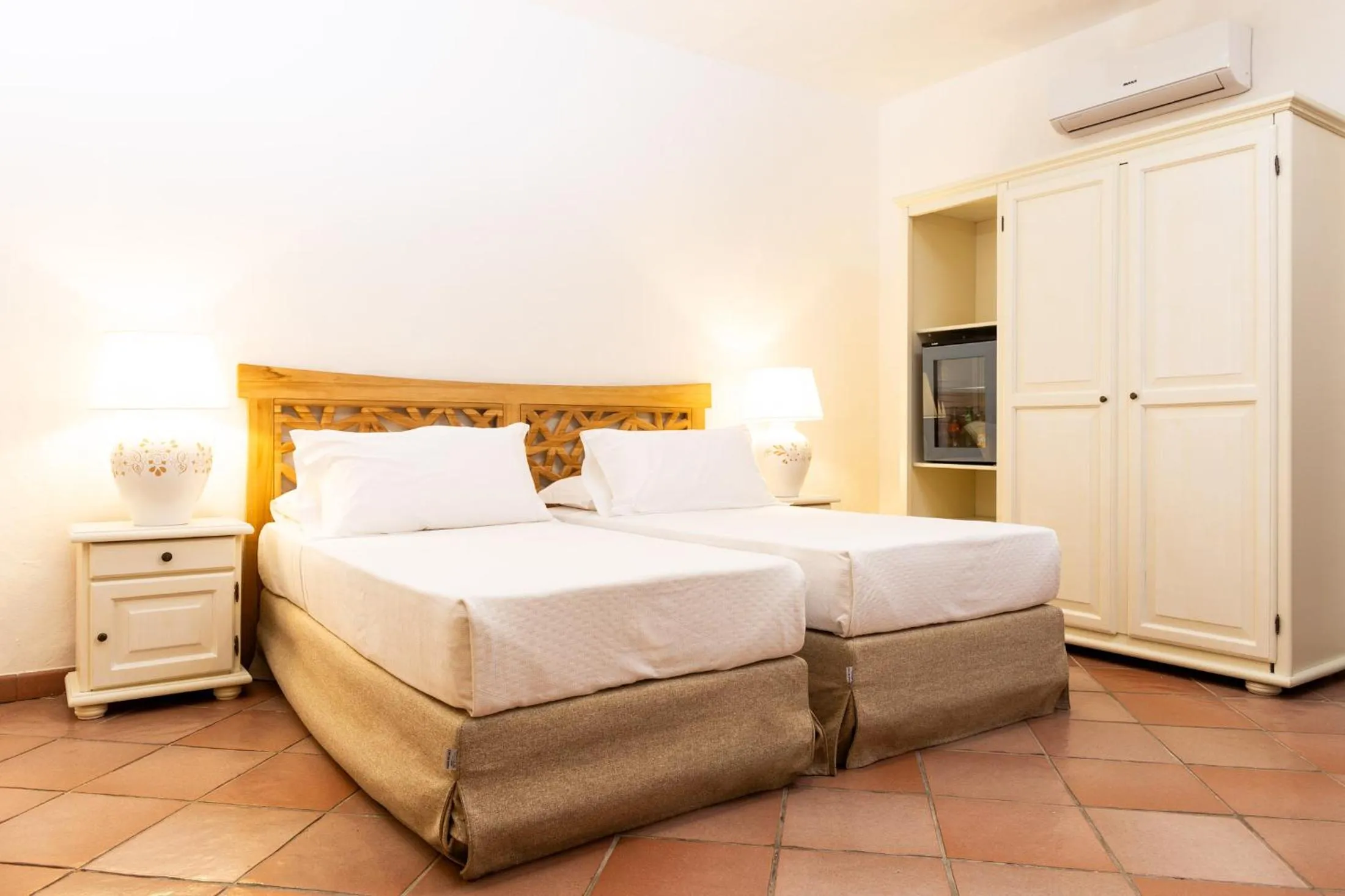 Bed in La Jacia Hotel & Resort