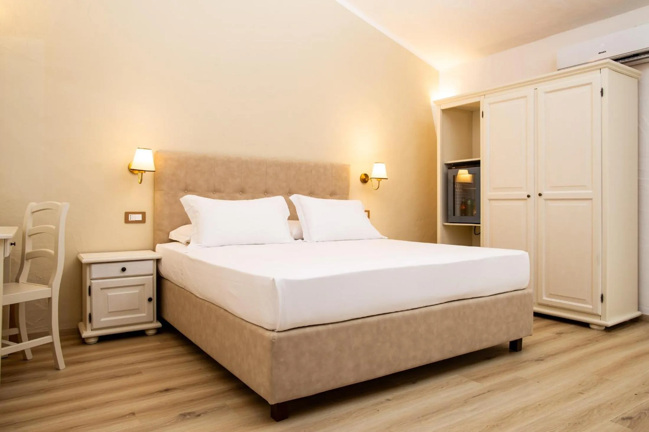 Bed in La Jacia Hotel & Resort