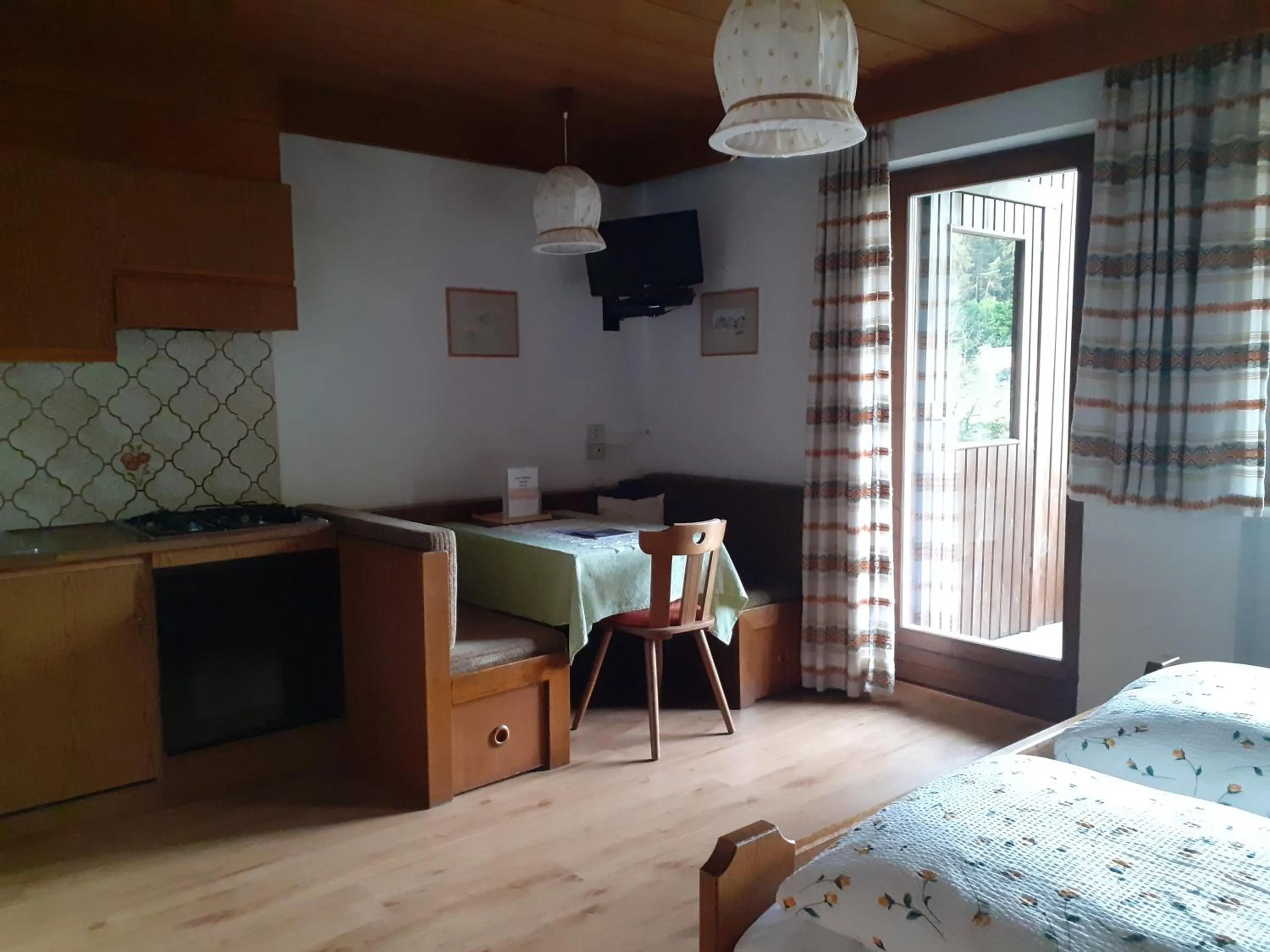 Photo of the whole room, Bed in Residence Rienz