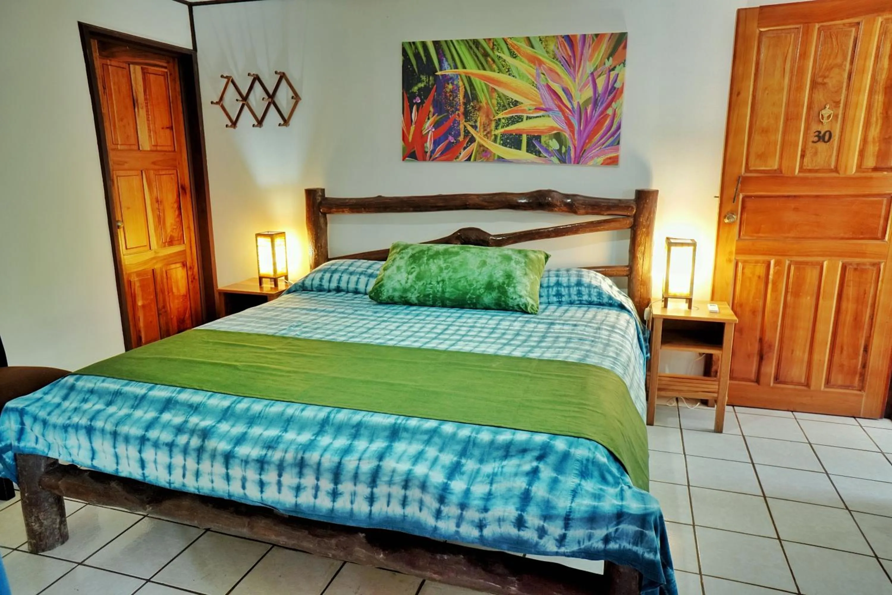 Bed in La Quinta Sarapiqui Lodge