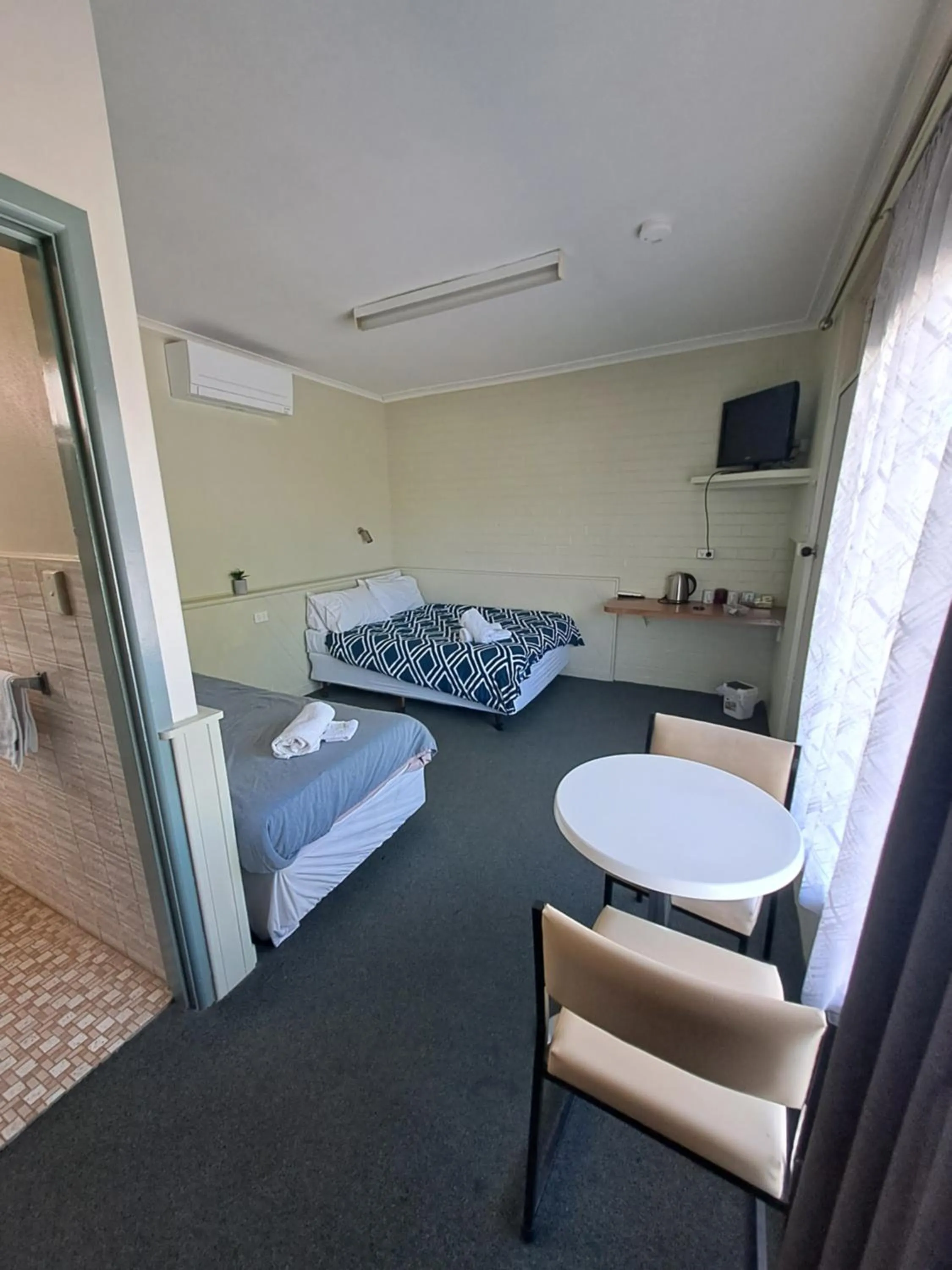 Bed in Great Western Motel