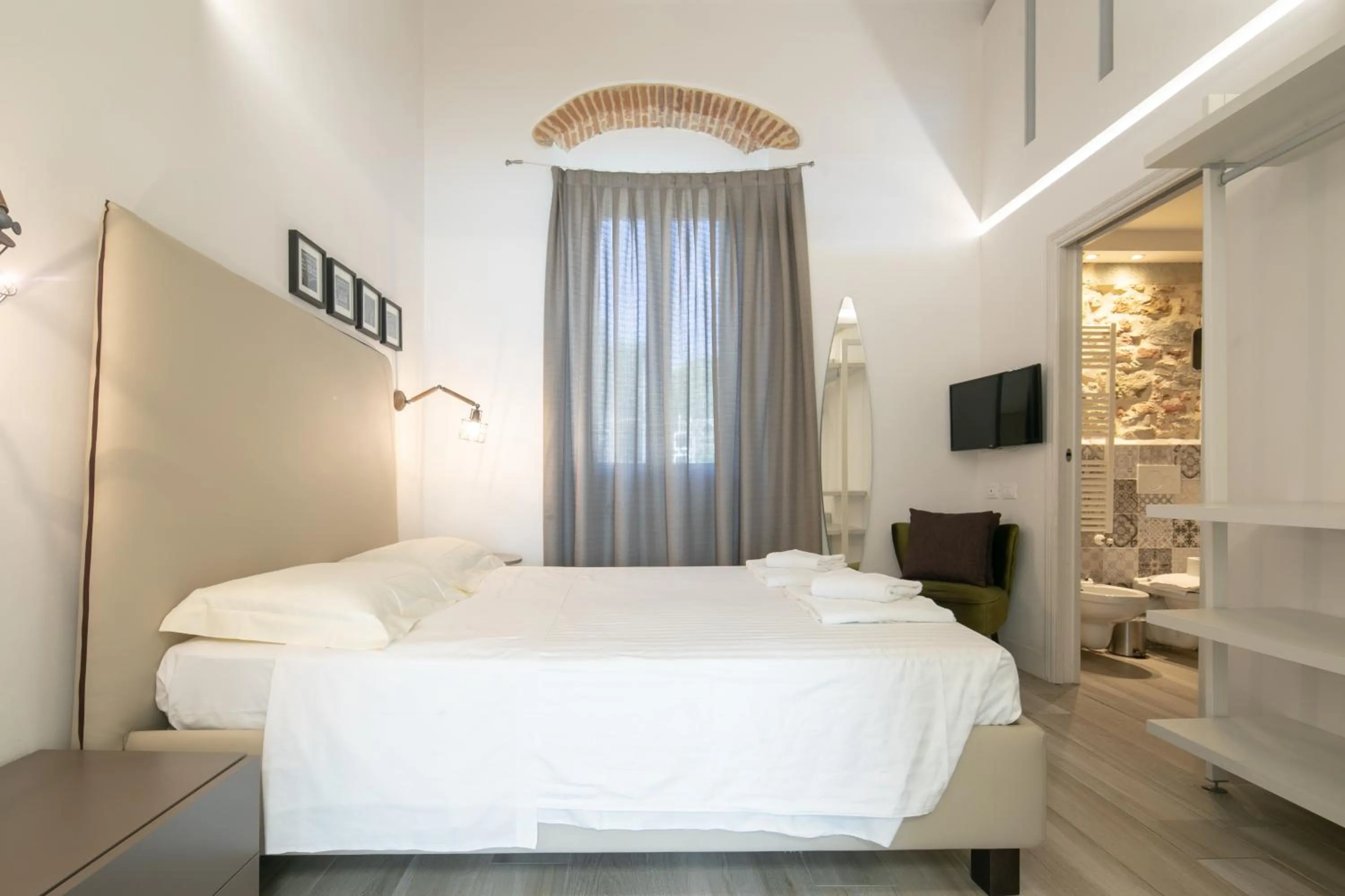 Bed in Giglio Apartments by Mmega