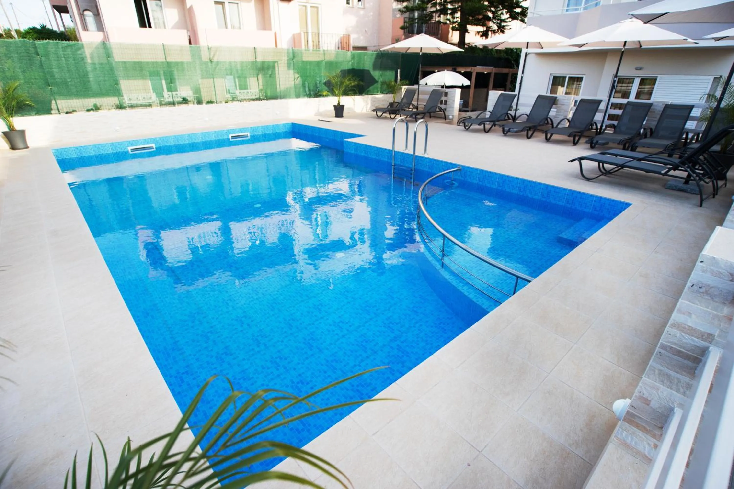 Swimming pool in Naiades Luxury Apartments