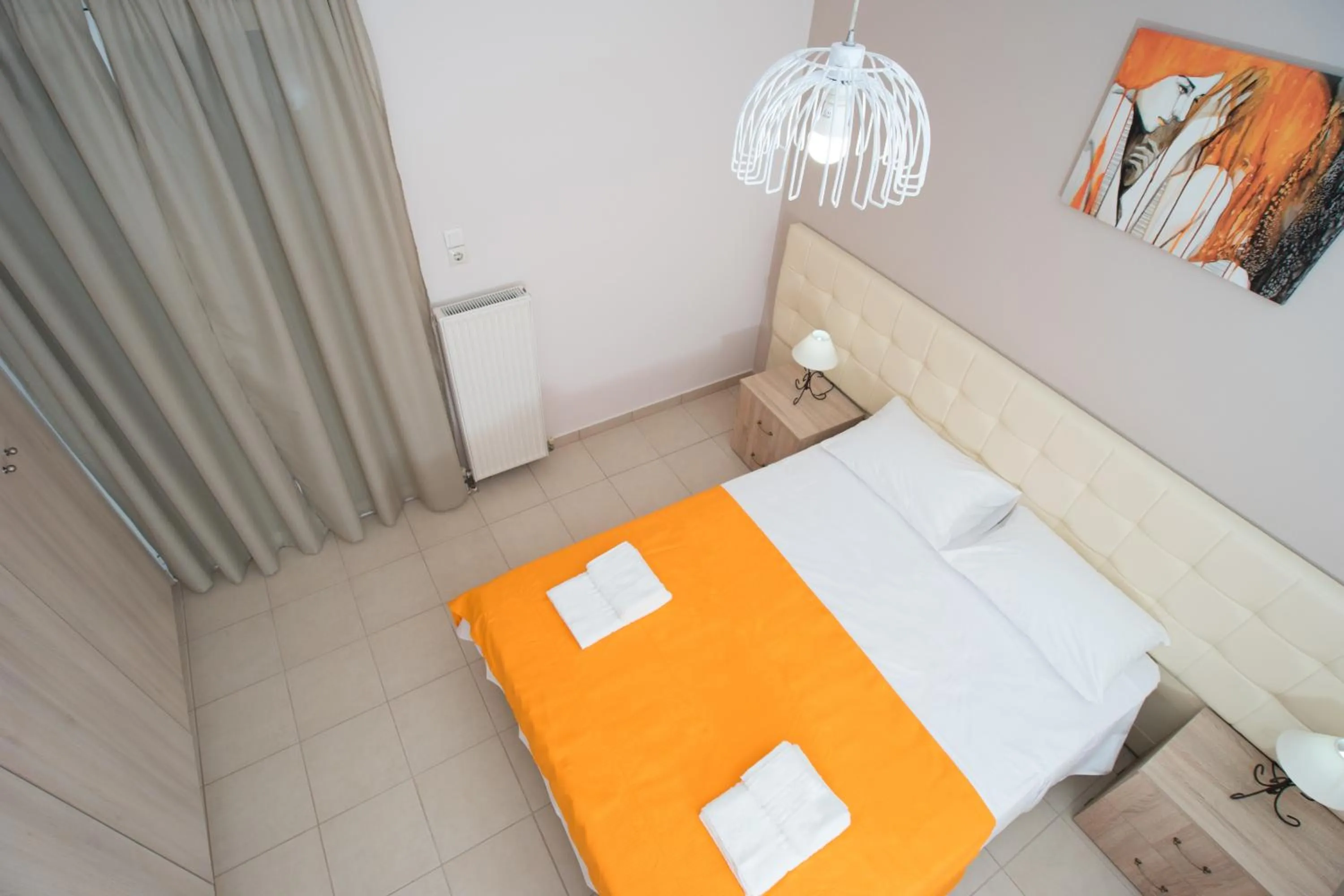 Bed in Naiades Luxury Apartments