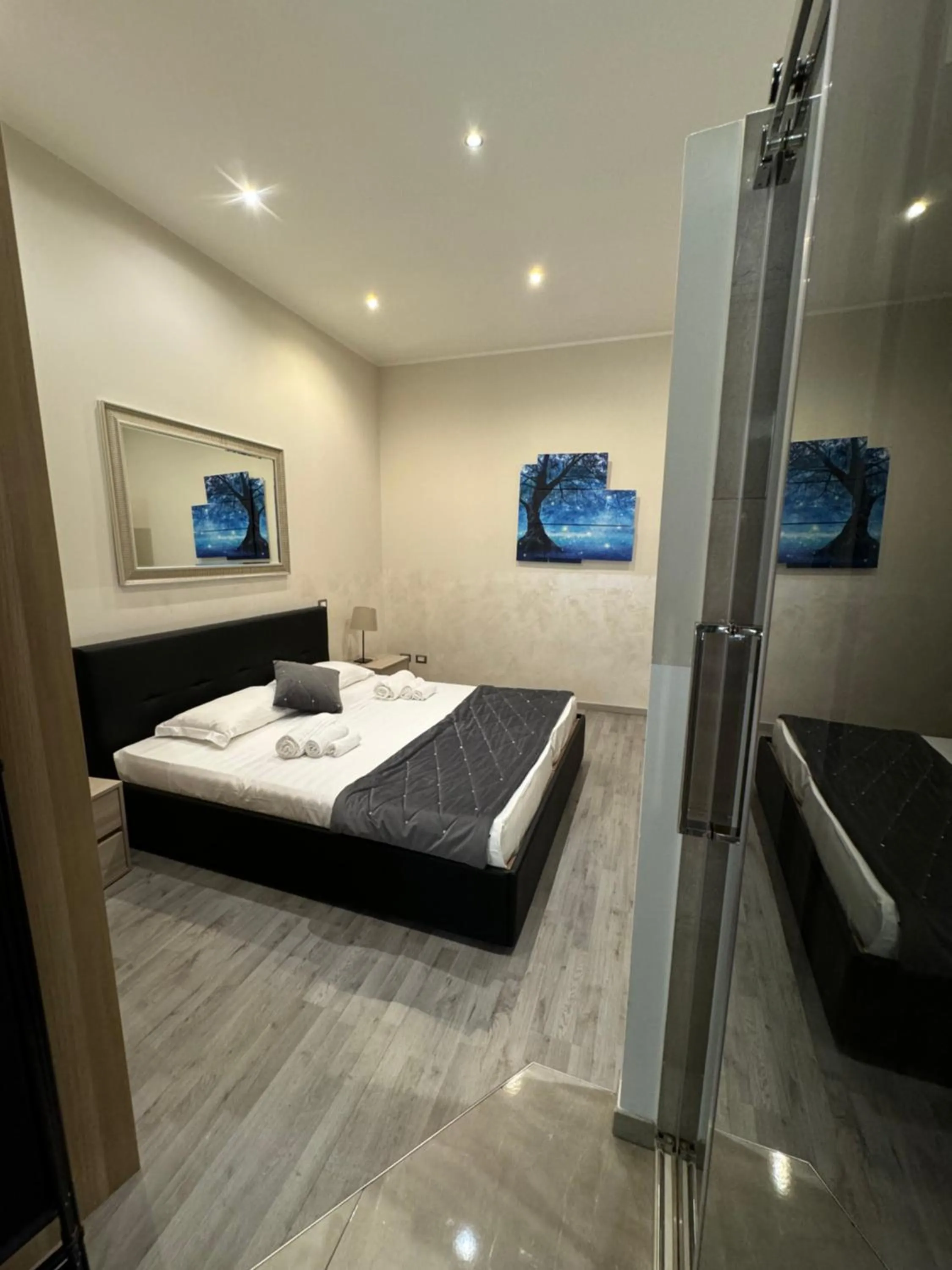 Bed in RHS Rienzo Suites