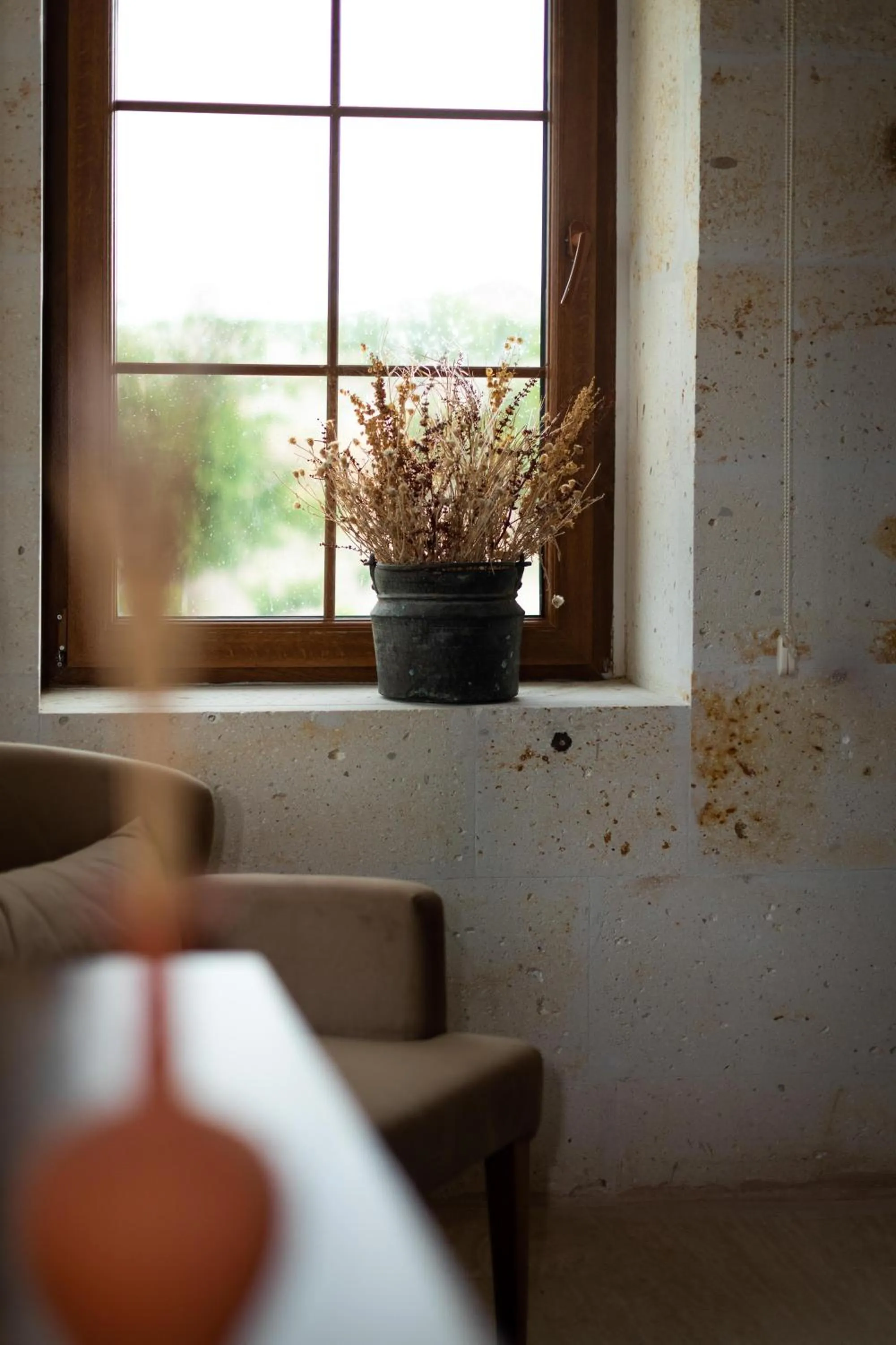 Seating area in Esens Stone House
