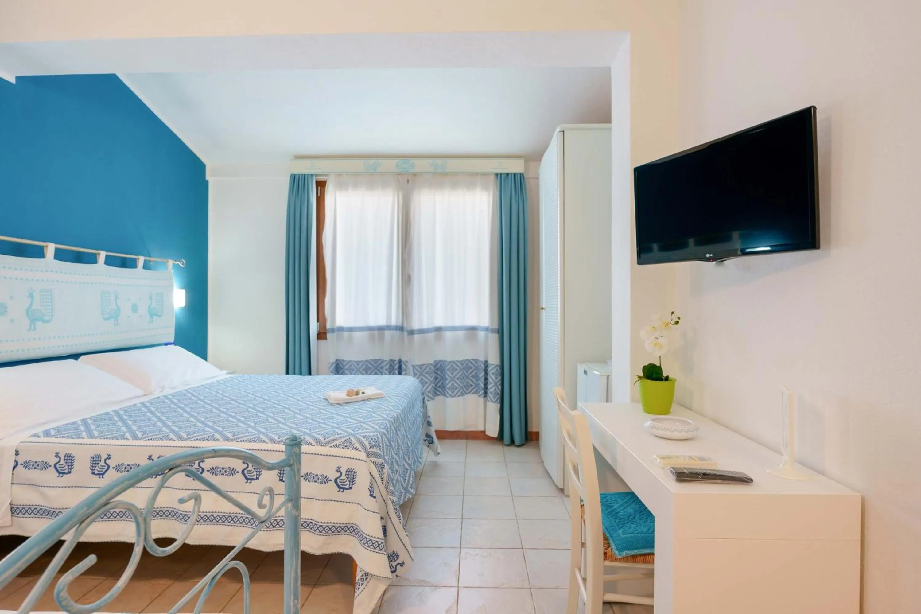 Bedroom in Il Piccolo Giardino rooms & breakfast