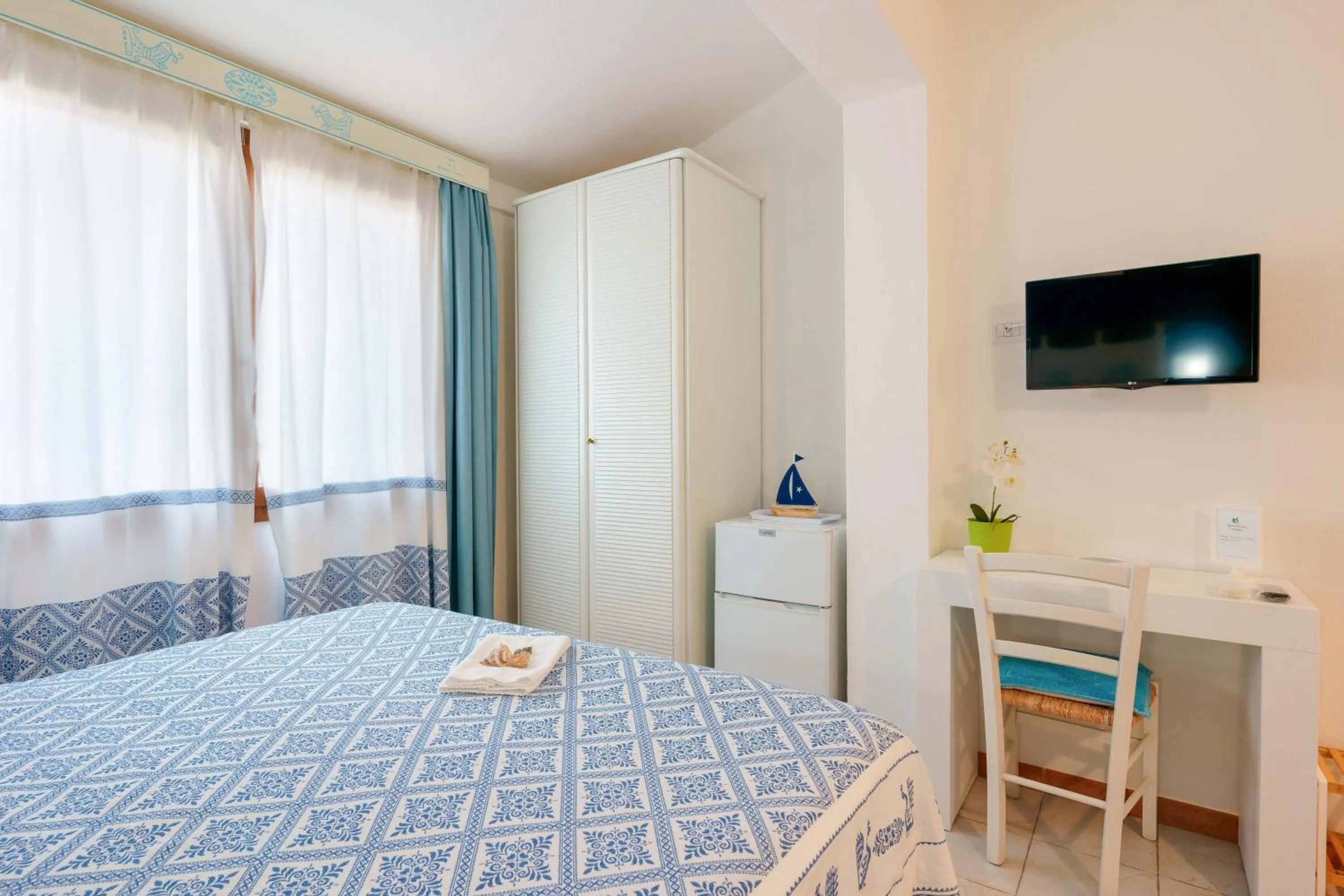 Bedroom in Il Piccolo Giardino rooms & breakfast