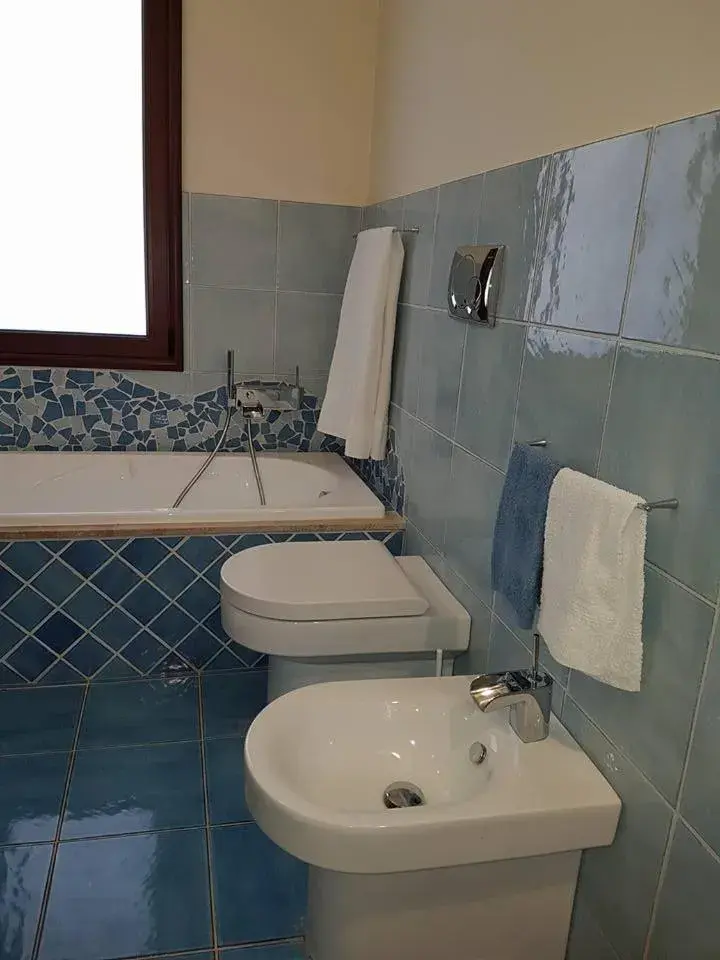 Quadruple Room with Balcony in Il Piccolo Giardino rooms & breakfast Quadruple Room with Balcony in Il Piccolo Giardino rooms & breakfast