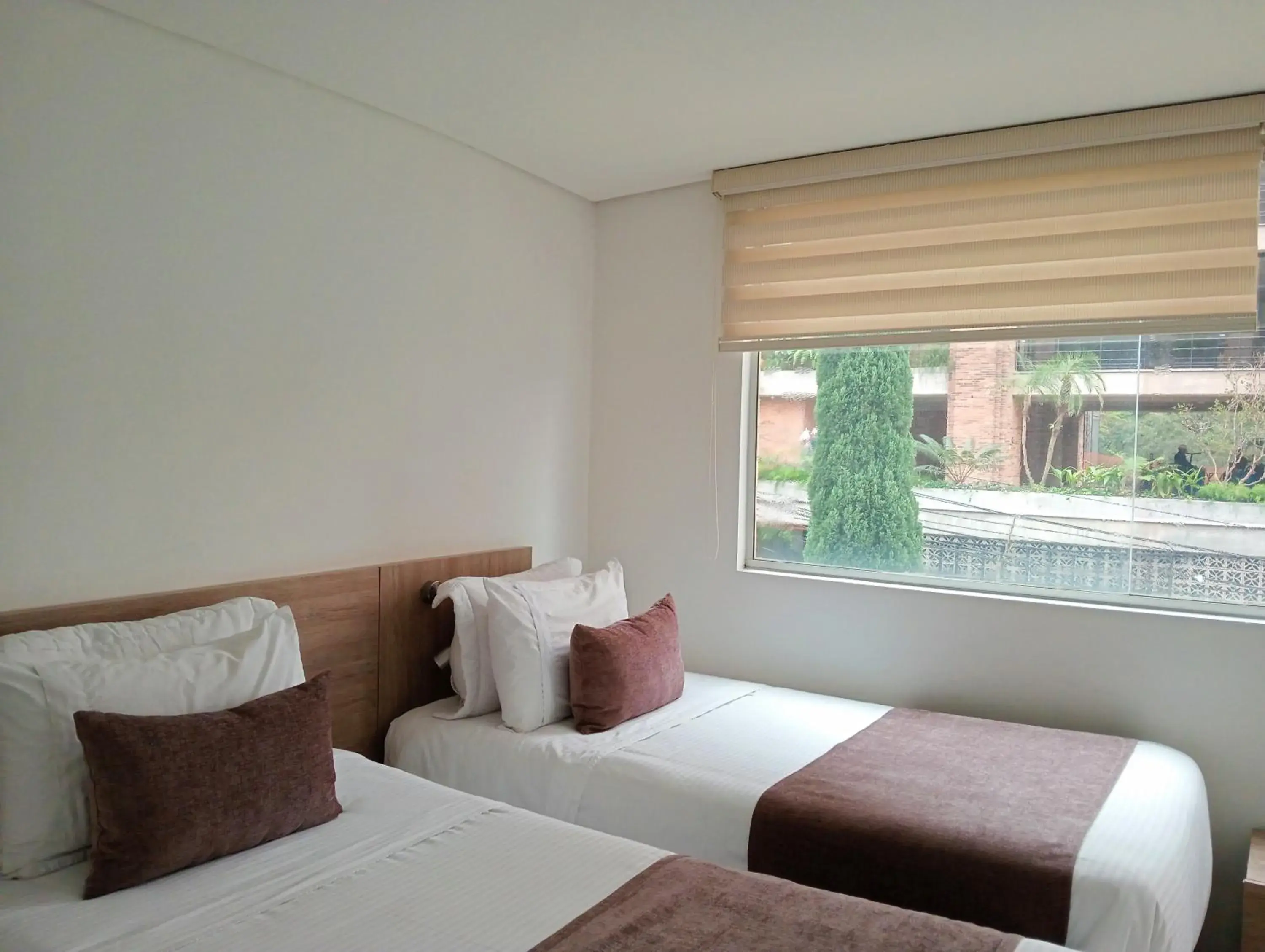 Triple Room in Hotel Lomas 10 Medellin Triple Room in Hotel Lomas 10 Medellin